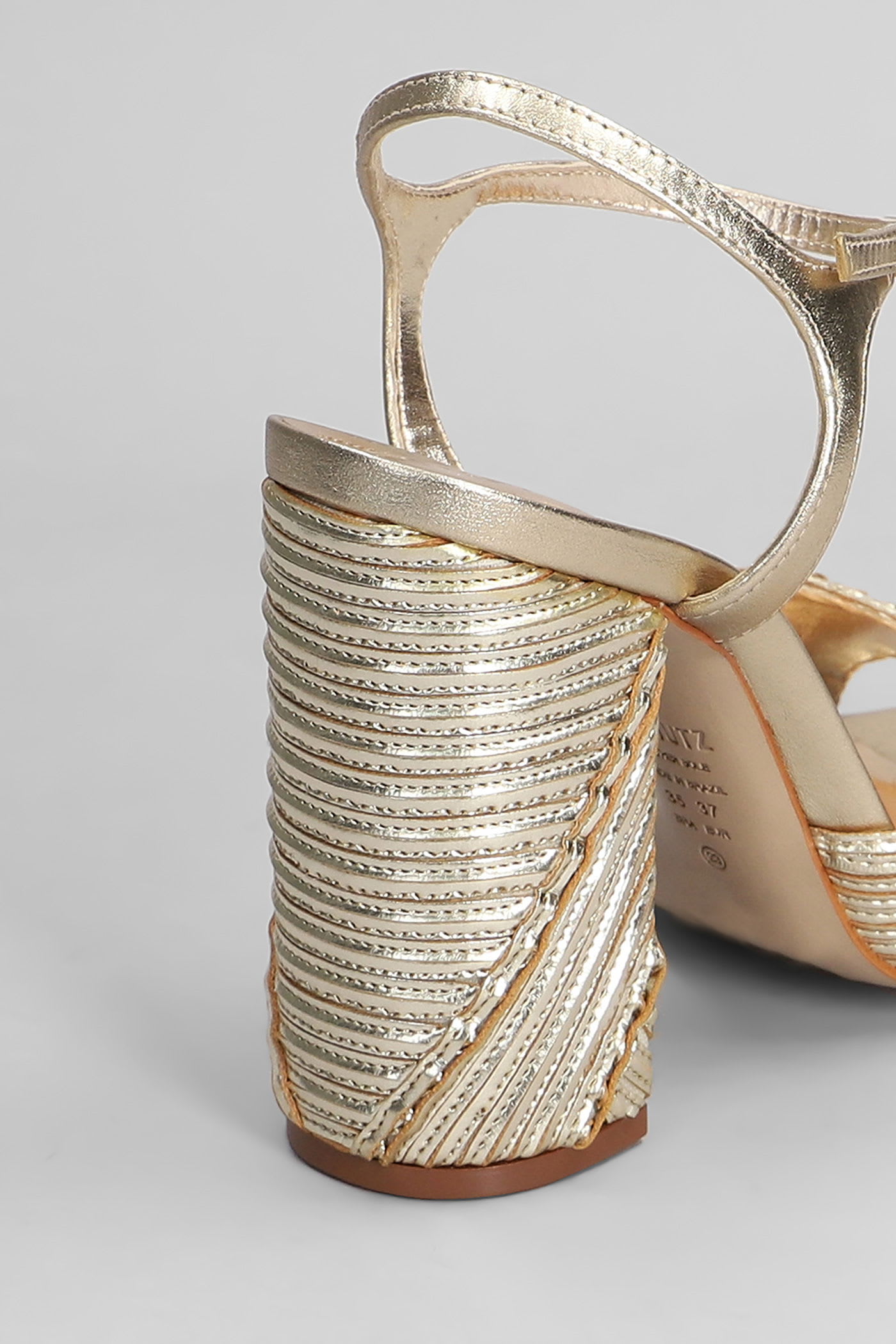 Shop Schutz Lupita Sandals In Gold Leather