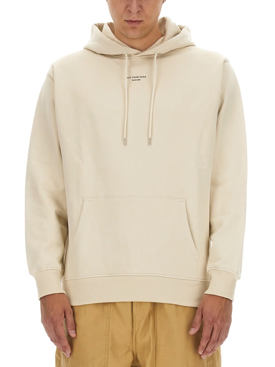 Shop Drôle De Monsieur Hoodie In Beige