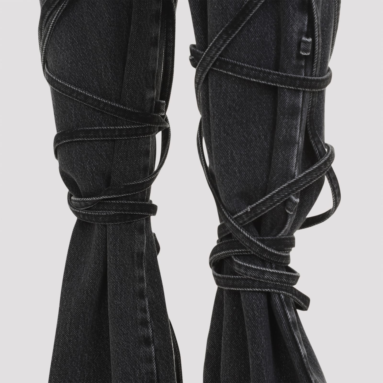 Alexander Mcqueen Mcqueen Wrapped Asymmetric Waist Jeans In Black Stonewashed