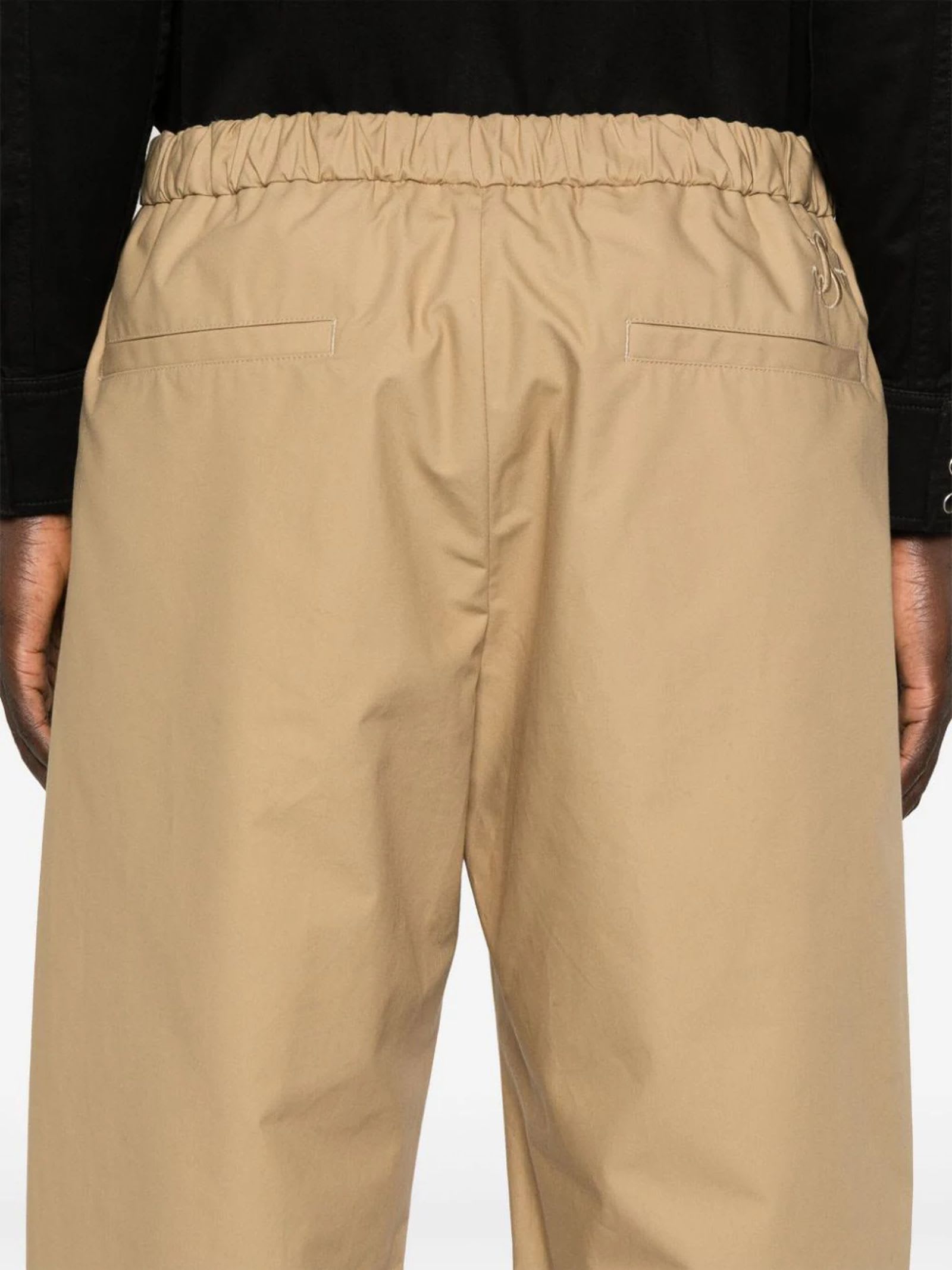 Shop Jil Sander Trousers Beige