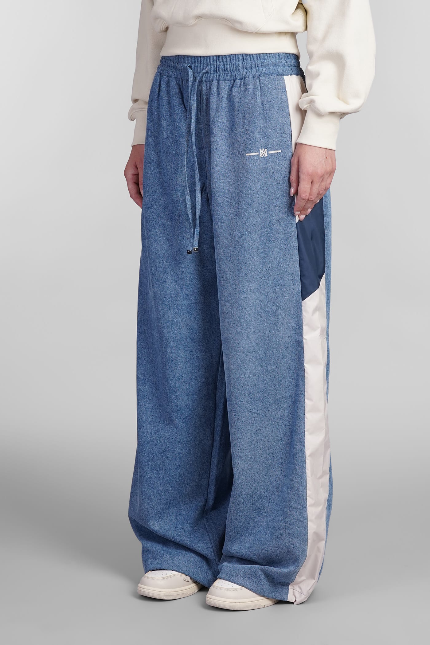 Shop Amiri Pants In Blue Nylon