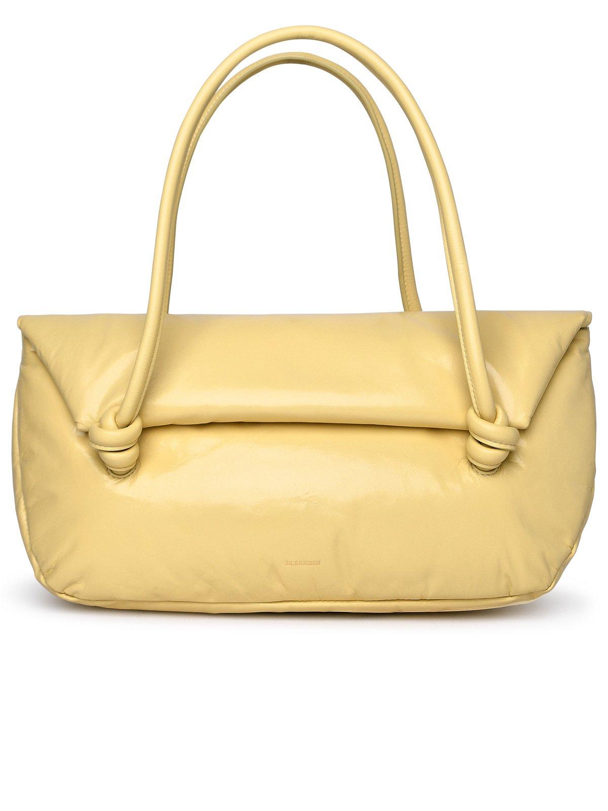 Shop Jil Sander Logo Printed Shoulder Bag In Yellow