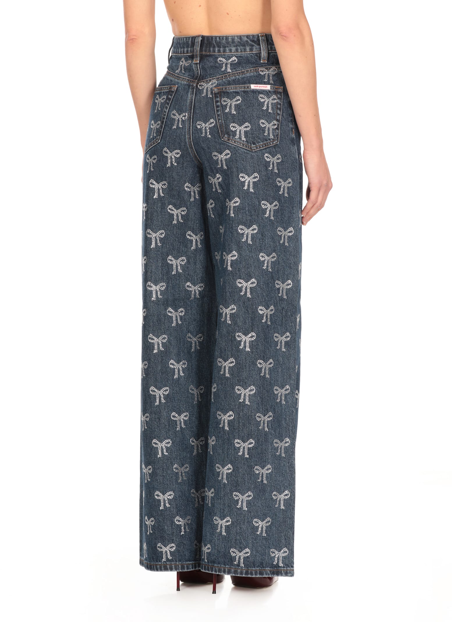 Self-portrait Blue Jeans With All-over Rhinestoned Bow Embellishments In Denim Woman In Blue