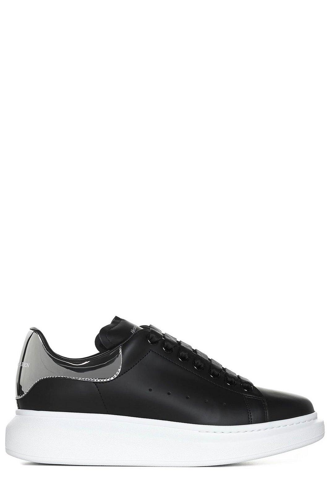 Shop Alexander Mcqueen Round Toe Laced Sneakers In Black