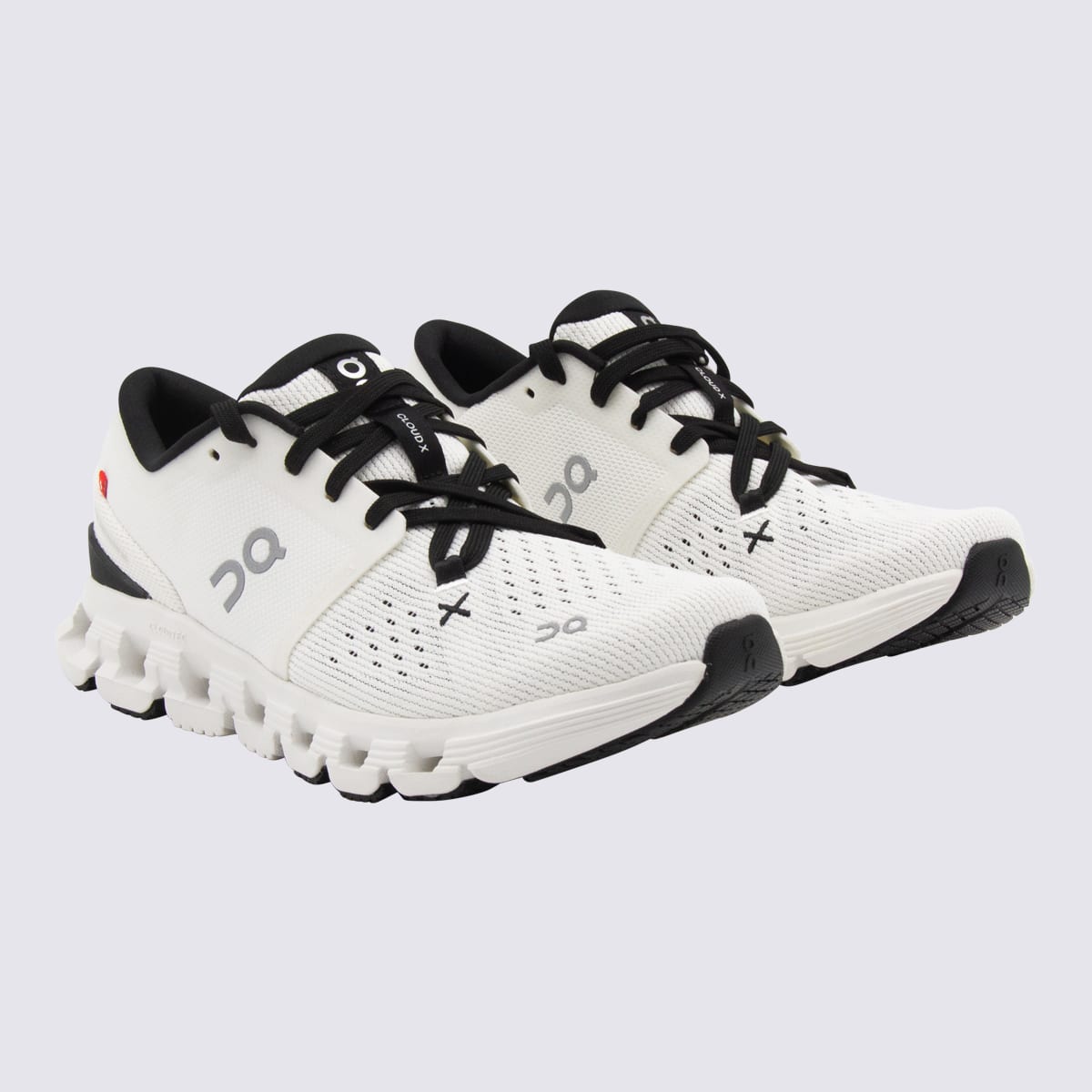 On Ivory And Black Cloud Sneakers In White