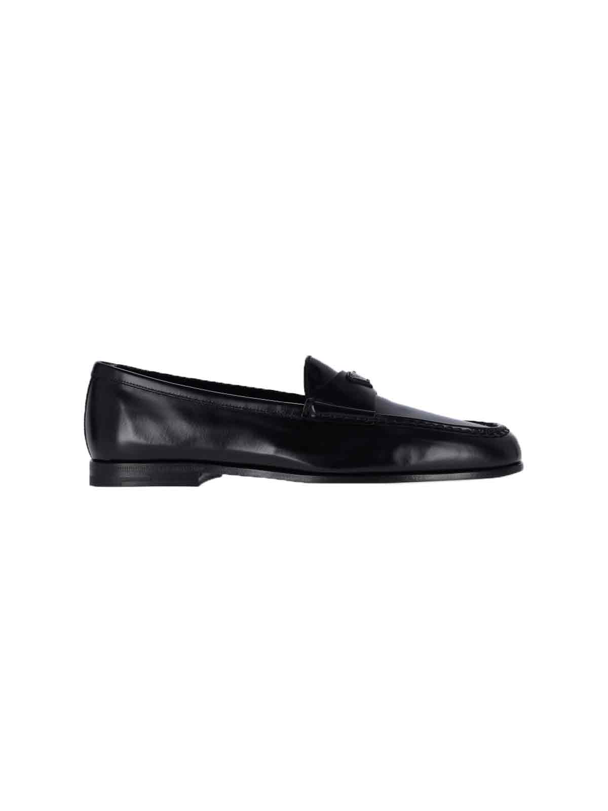 Prada Leather Loafers With Round Toe And Sole In Black