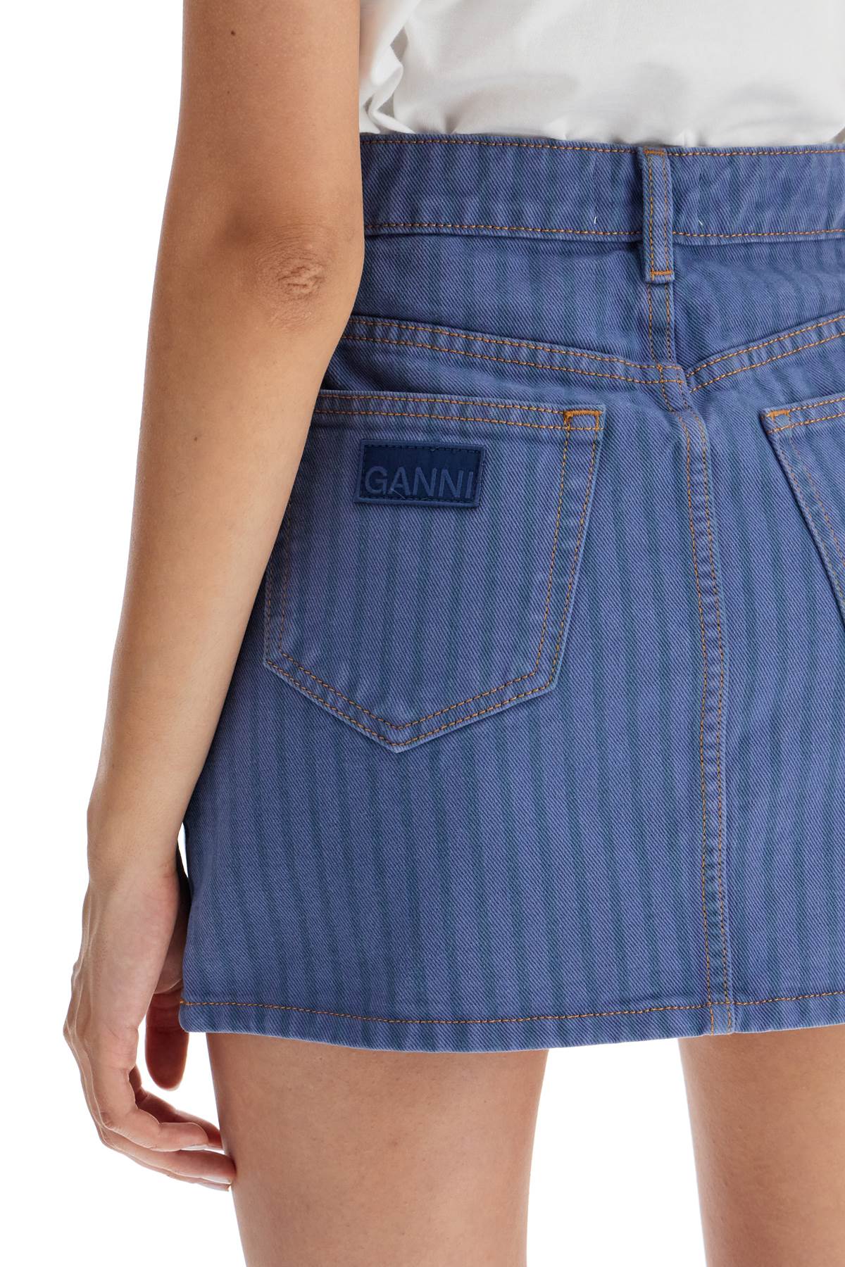 Shop Ganni Striped Overdyed Denim Mini In Country Blue (blue)