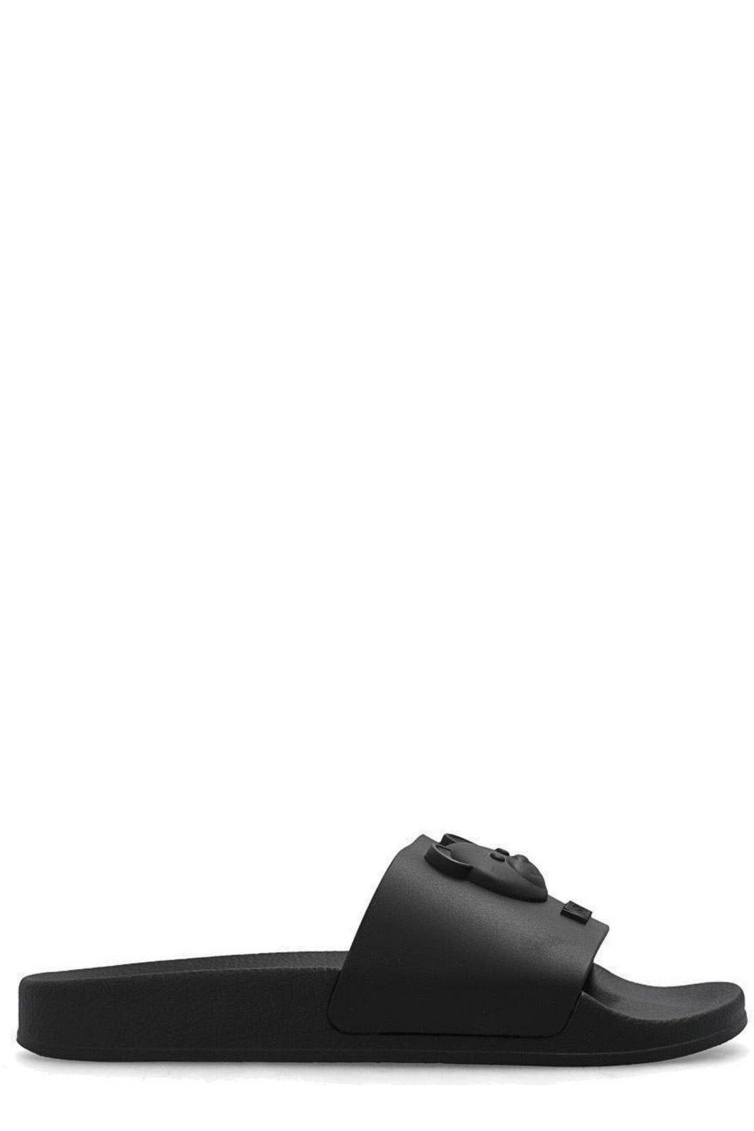Moschino Logo Embossed Slip-on Sandals In Black