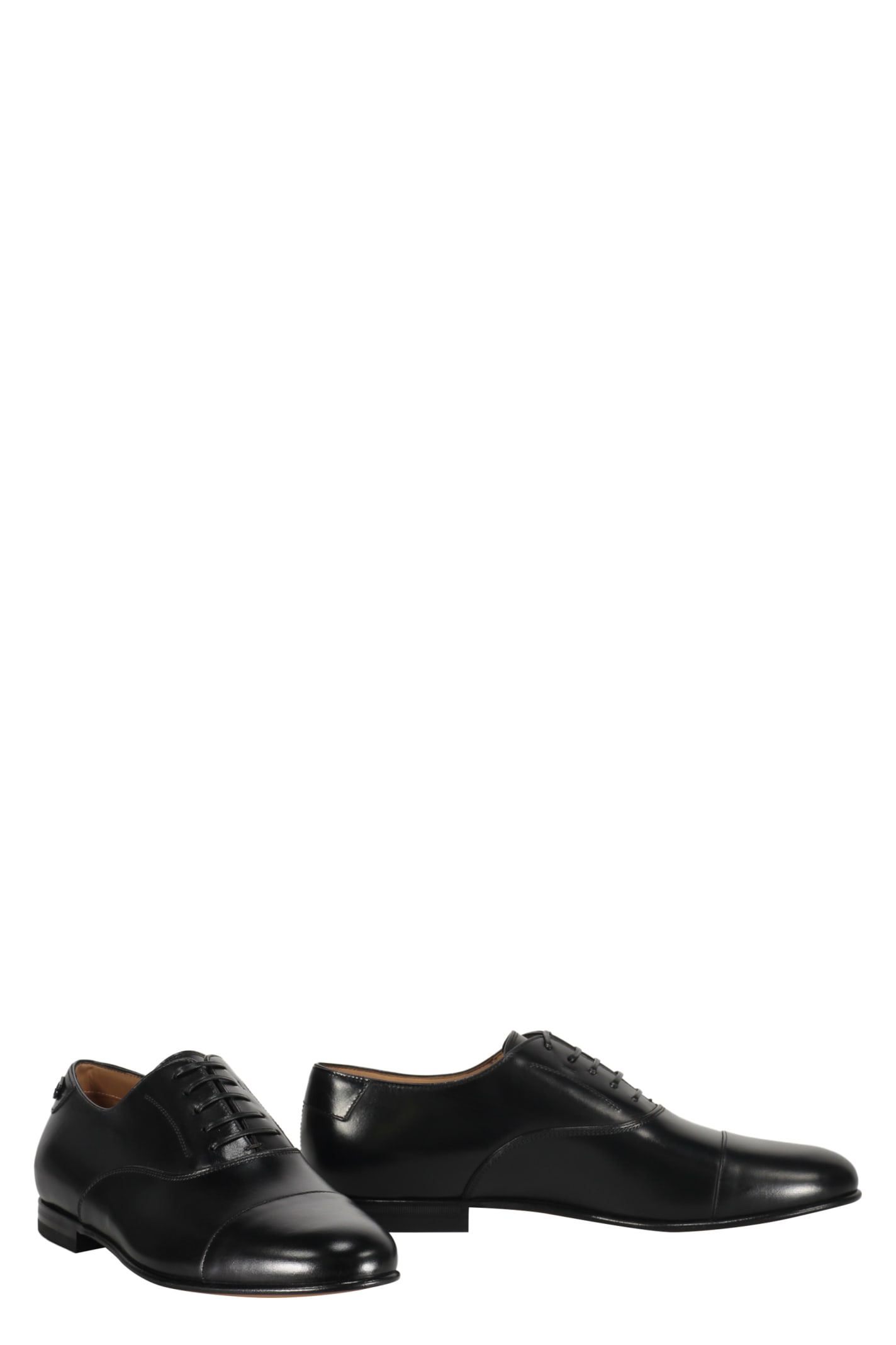 Shop Ferragamo Gillo Leather Lace-up Shoes In Black