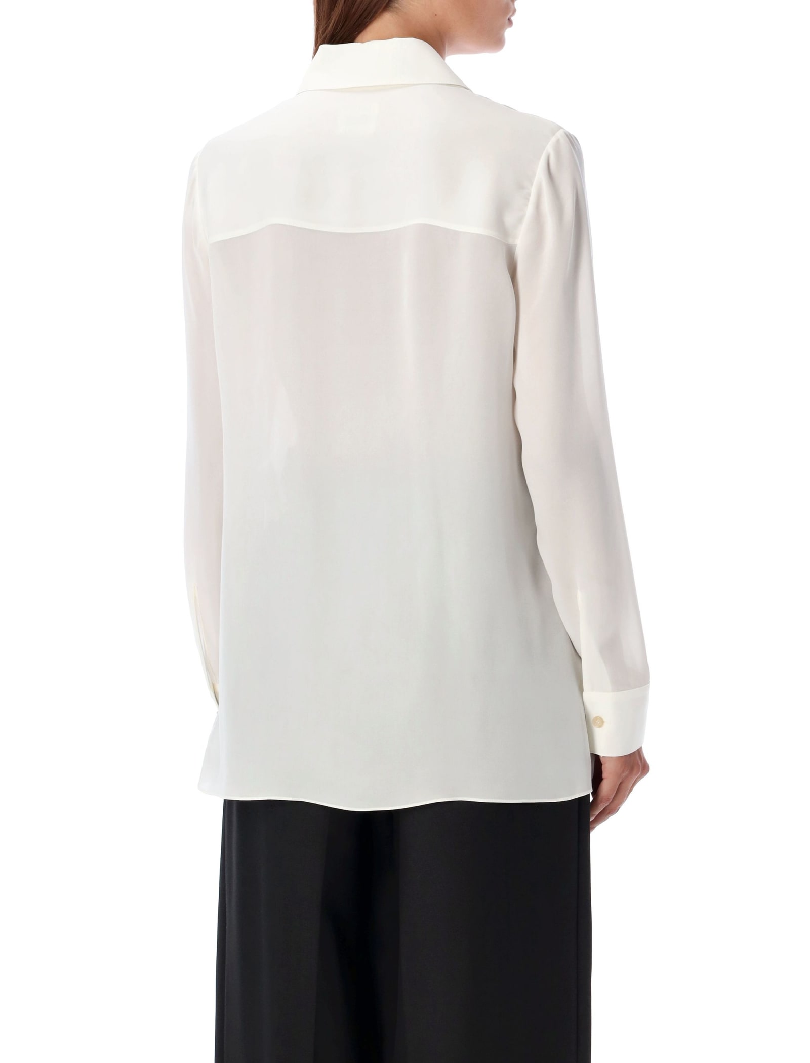 Shop Khaite Ruffled Top In White