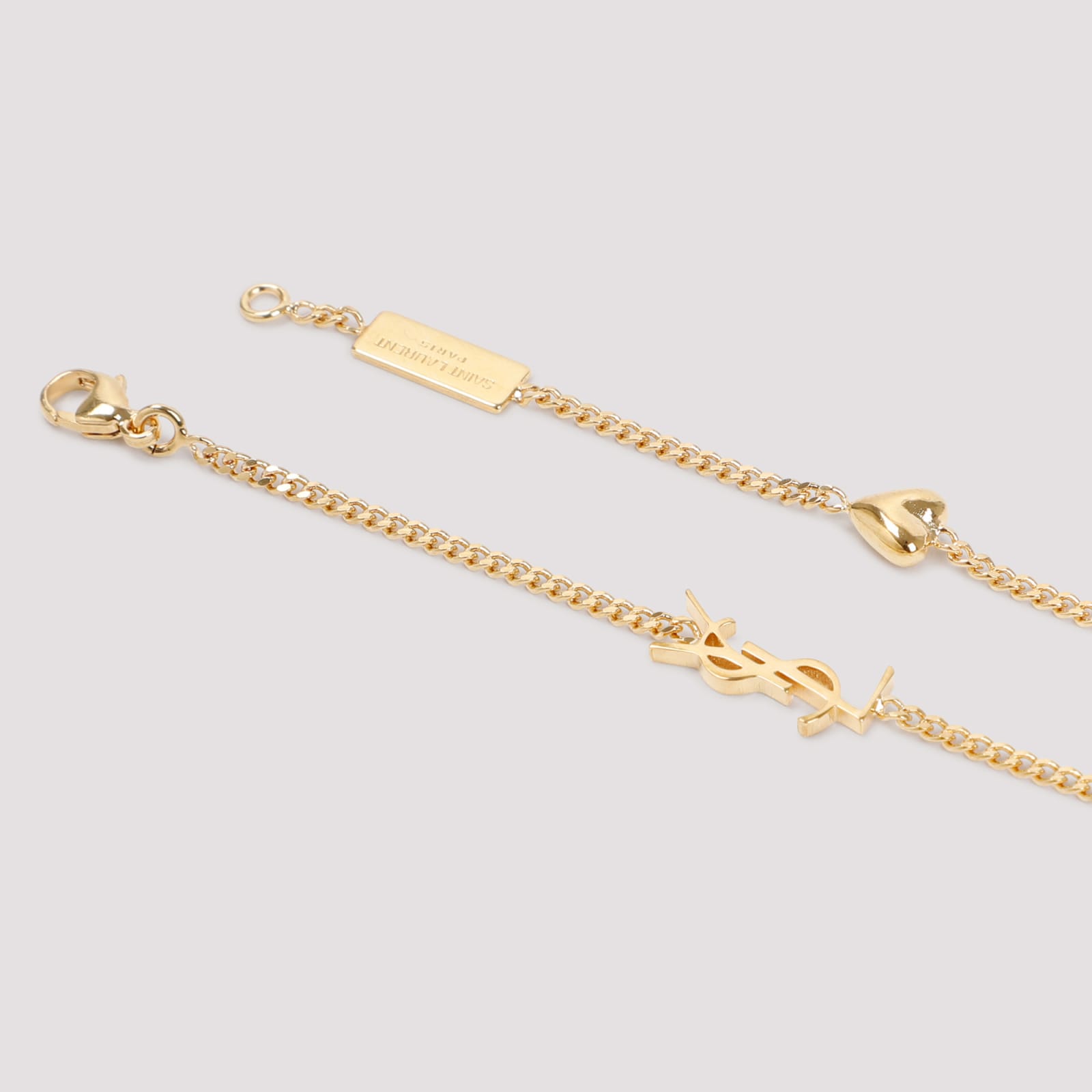 Saint Laurent Cassandre Heart Charm Bracelet In Gold