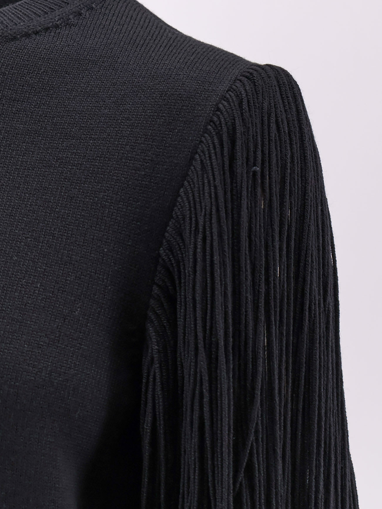 Alaïa Slit Fringe Sleeve Wool Crewneck Sweater In Black