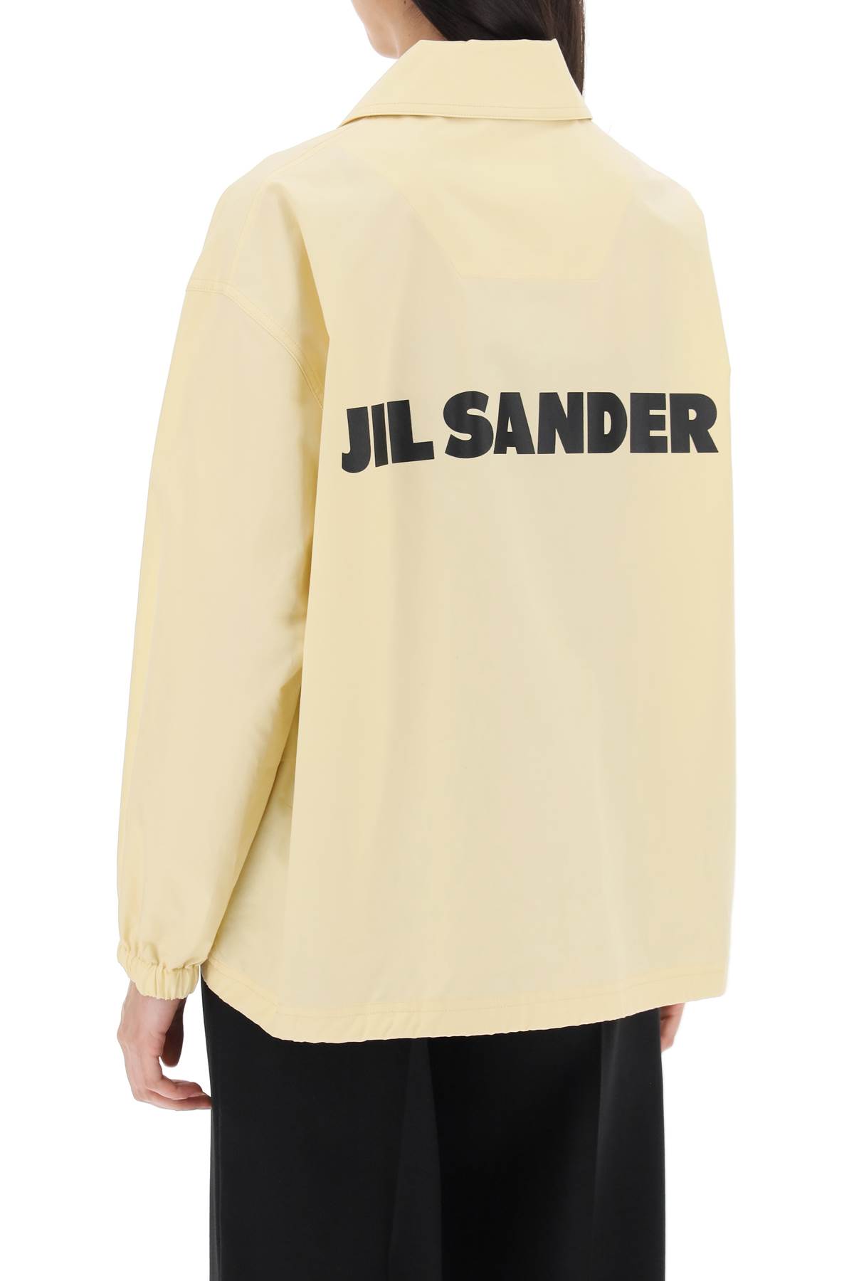 Shop Jil Sander Coach Jacket With Logo Print In Light Pastel Y (yellow)