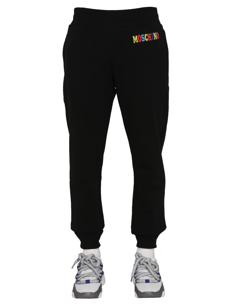 Shop Moschino Multicolor Logo Jogging Pants In Black