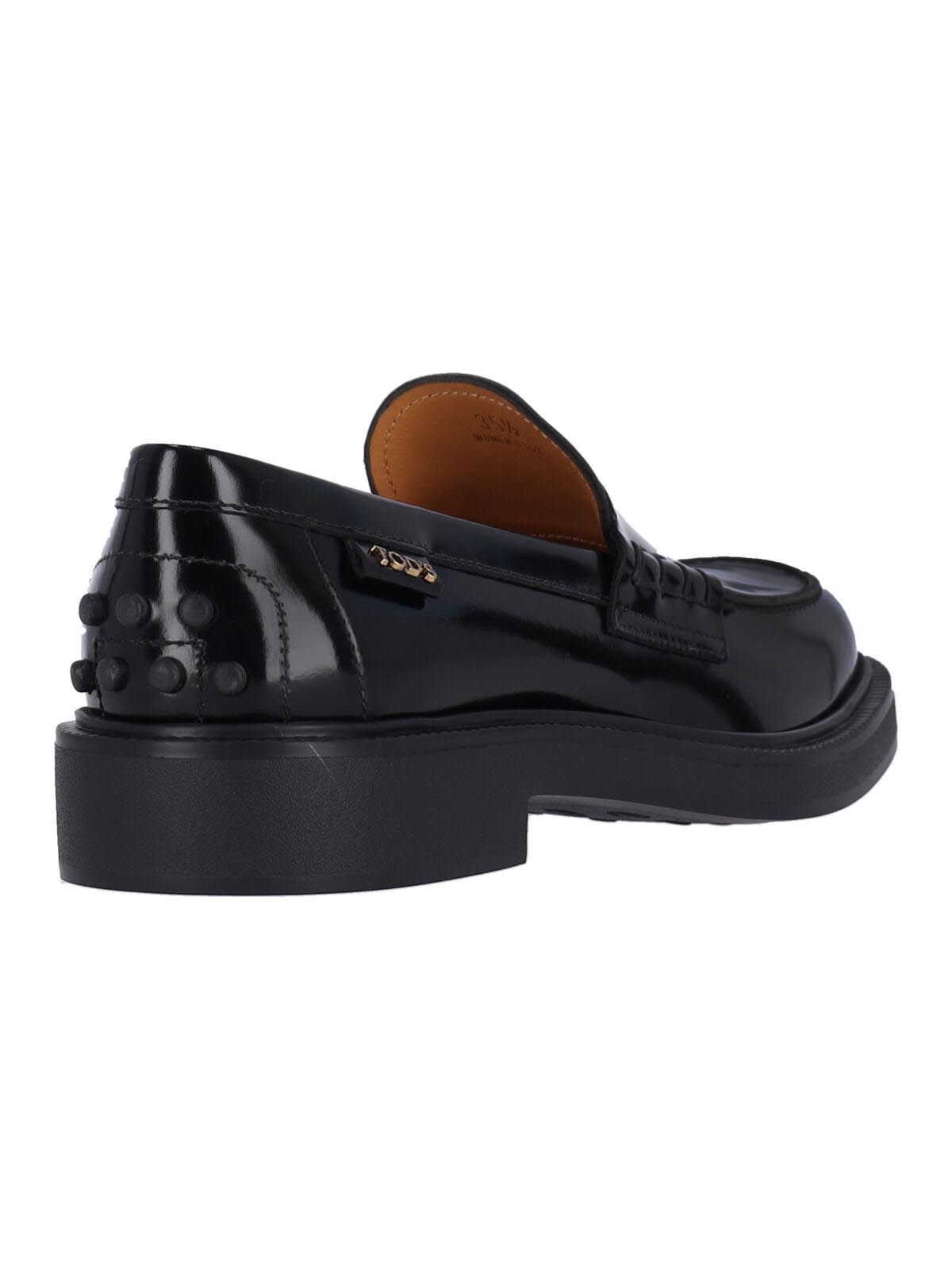 Tod's Mustard Gomma 20l Moccasins With Grommet-accented Heel In Black