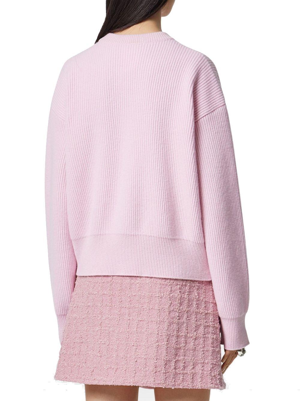 Shop Versace Logo Embroidered Knitted Jumper In Pale Pink