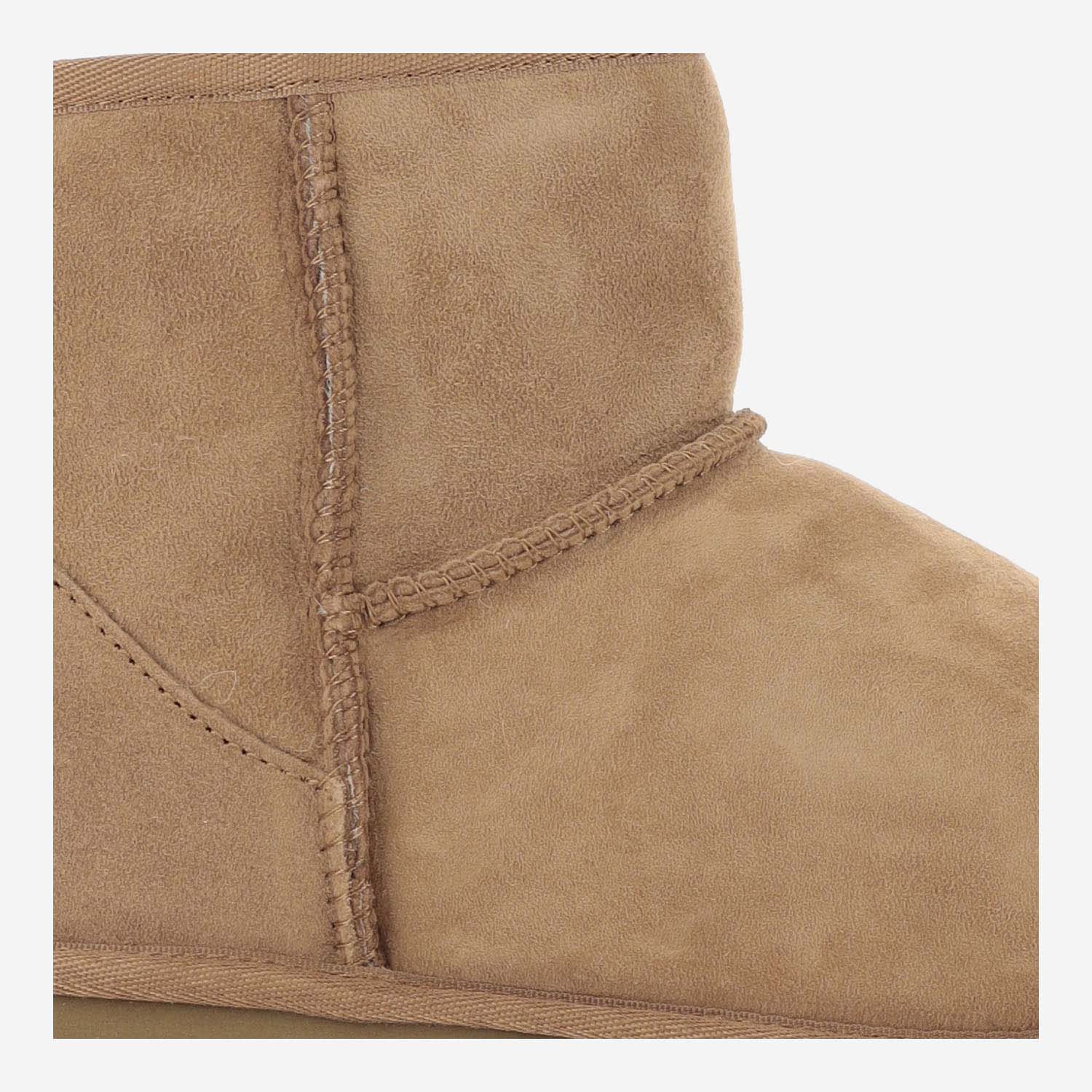 Shop Ugg Classic Mini Ankle Boots In Beige