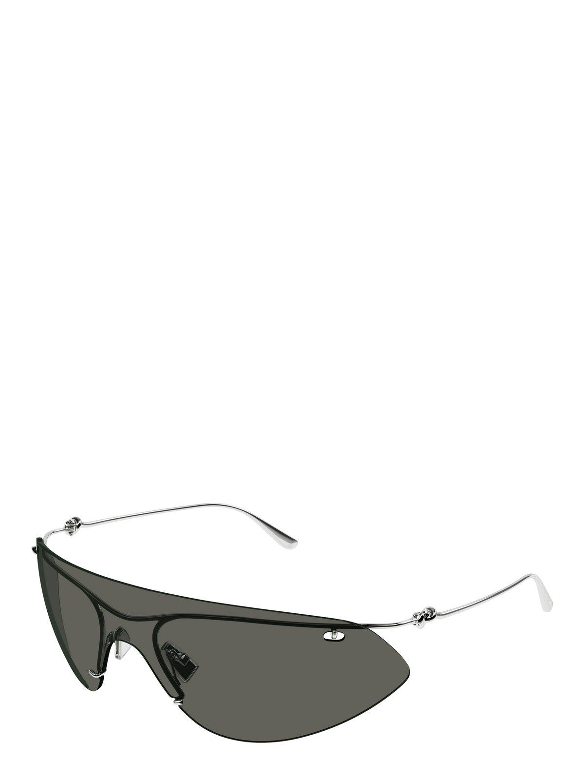 Shop Bottega Veneta Knot Shield Sunglasses In 002 Silver Silver Grey