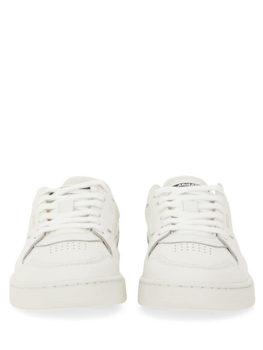 Shop Axel Arigato Sneaker Says It In White