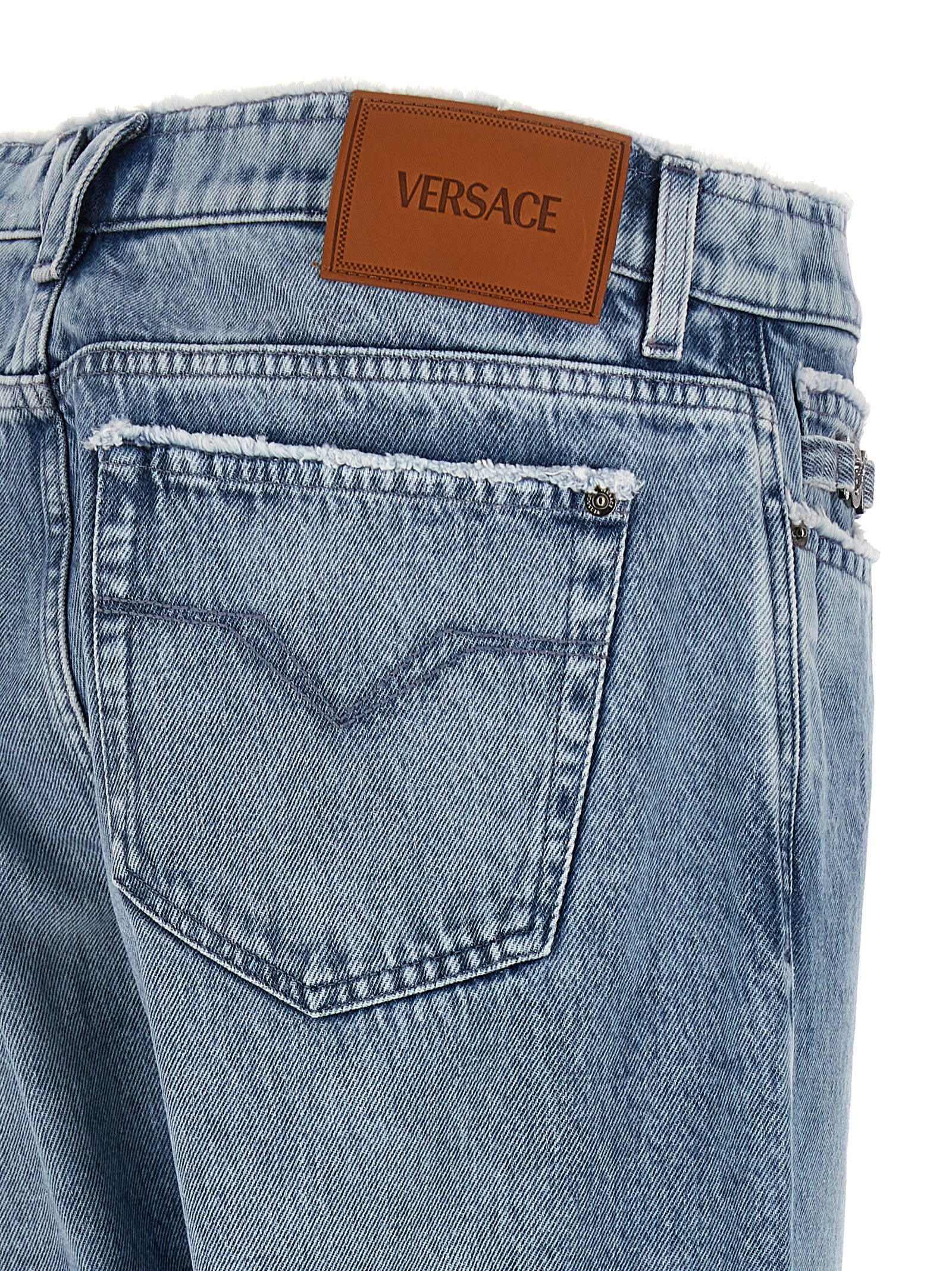 Shop Versace Fringed Jeans In Light Blue