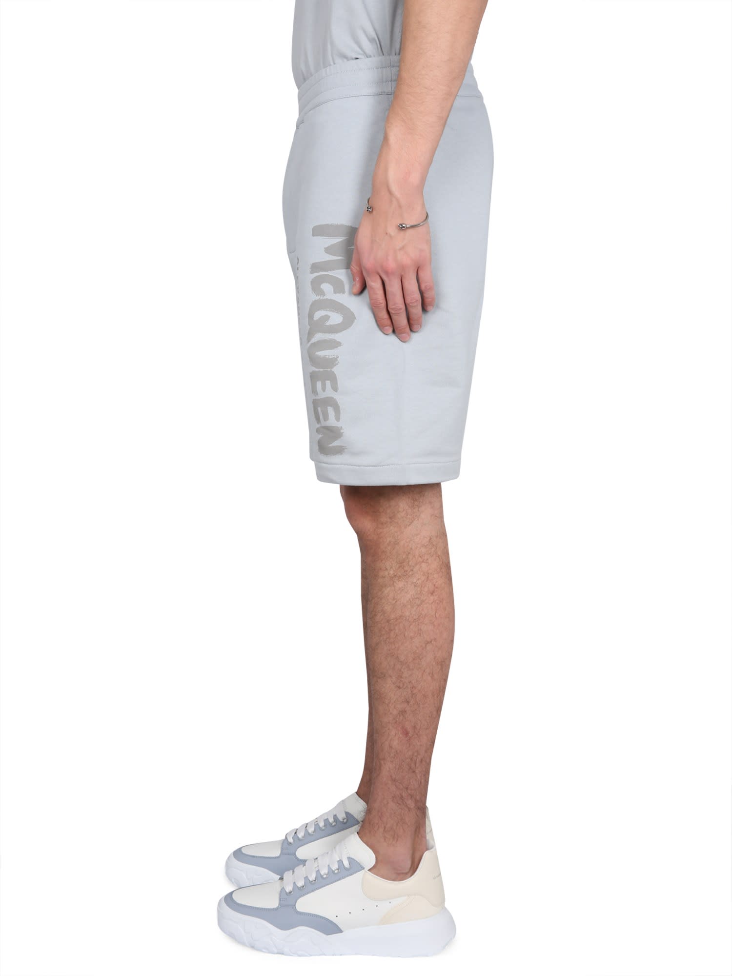 Alexander Mcqueen Men Bermuda Shorts With Graffiti Logo Print In Grey
