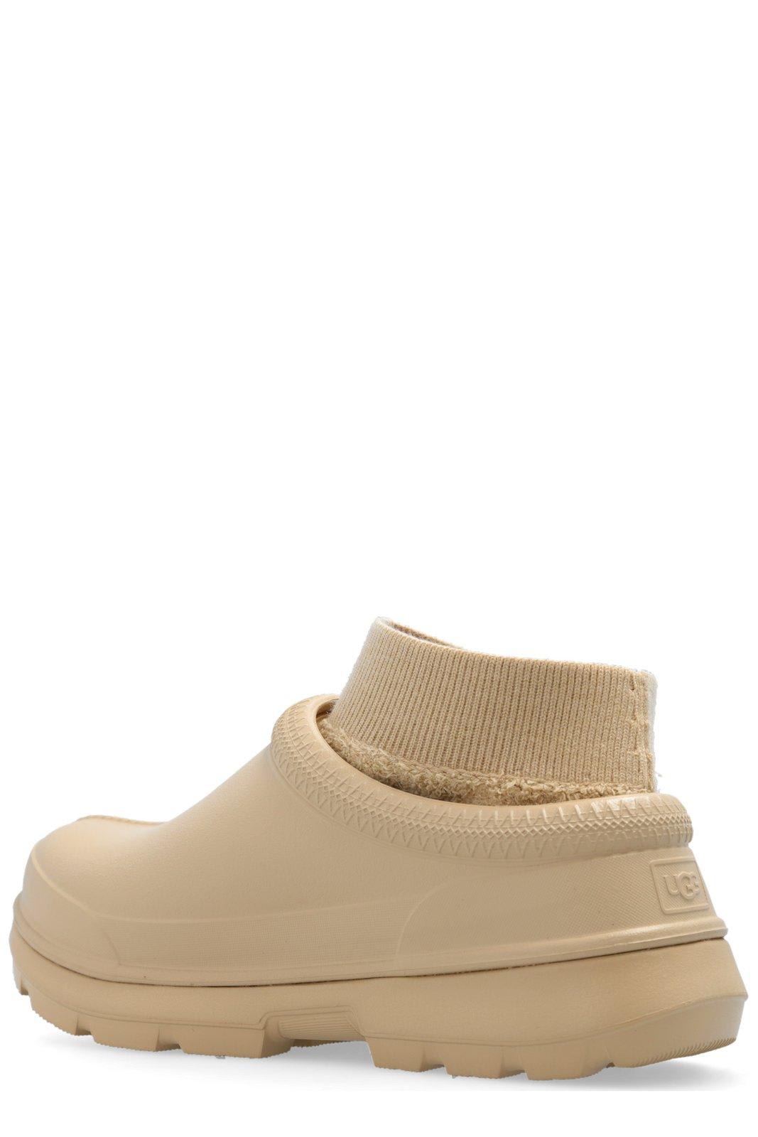 Shop Ugg Tasman Round Toe Ankle Boots In Beige