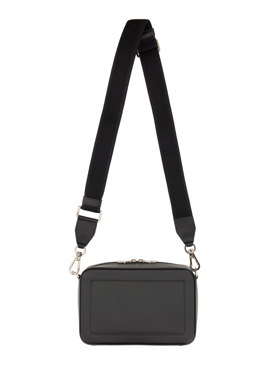 Shop Dolce & Gabbana Logo Embossed Shoulder Bag In Black