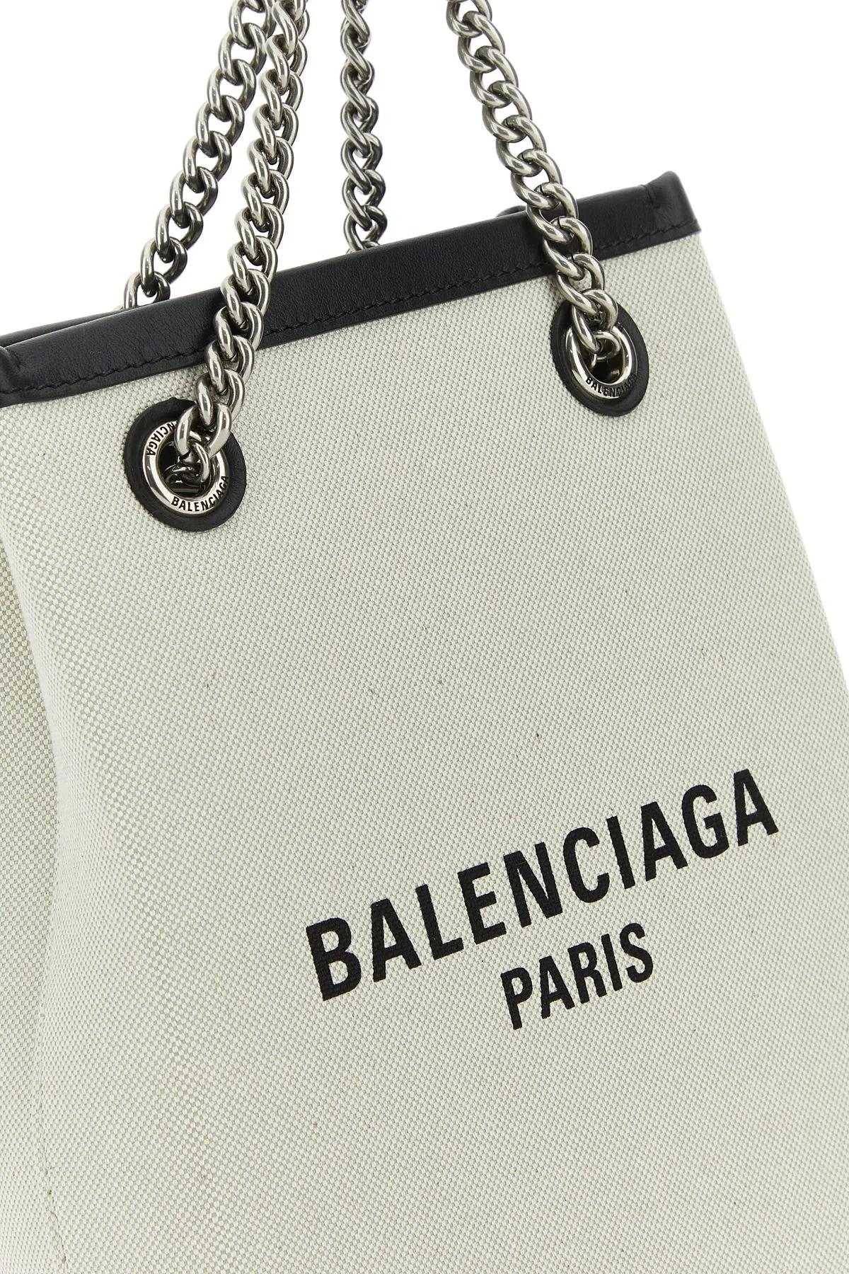 Shop Balenciaga Sand Canvas Duty Free Handbag In Beige