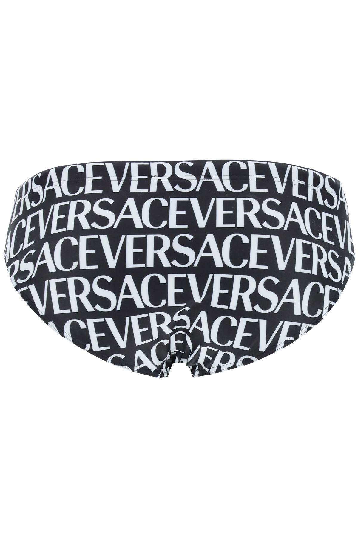 Shop Versace Allover Swim Briefs In Black White (white)