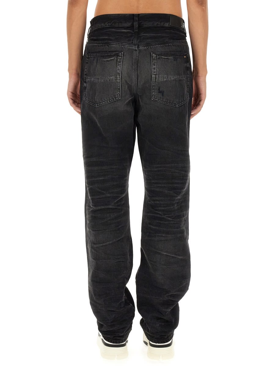 Shop Amiri Straight Fit Stack Jeans In Black