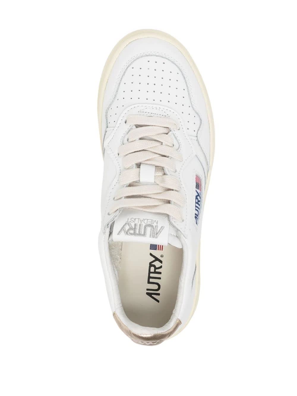 Shop Autry Medalist Low Sneakers In White And Gold Leather