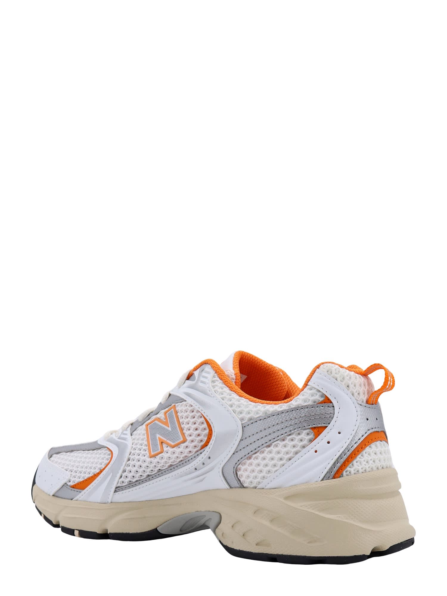 Shop New Balance 530 Sneakers In White