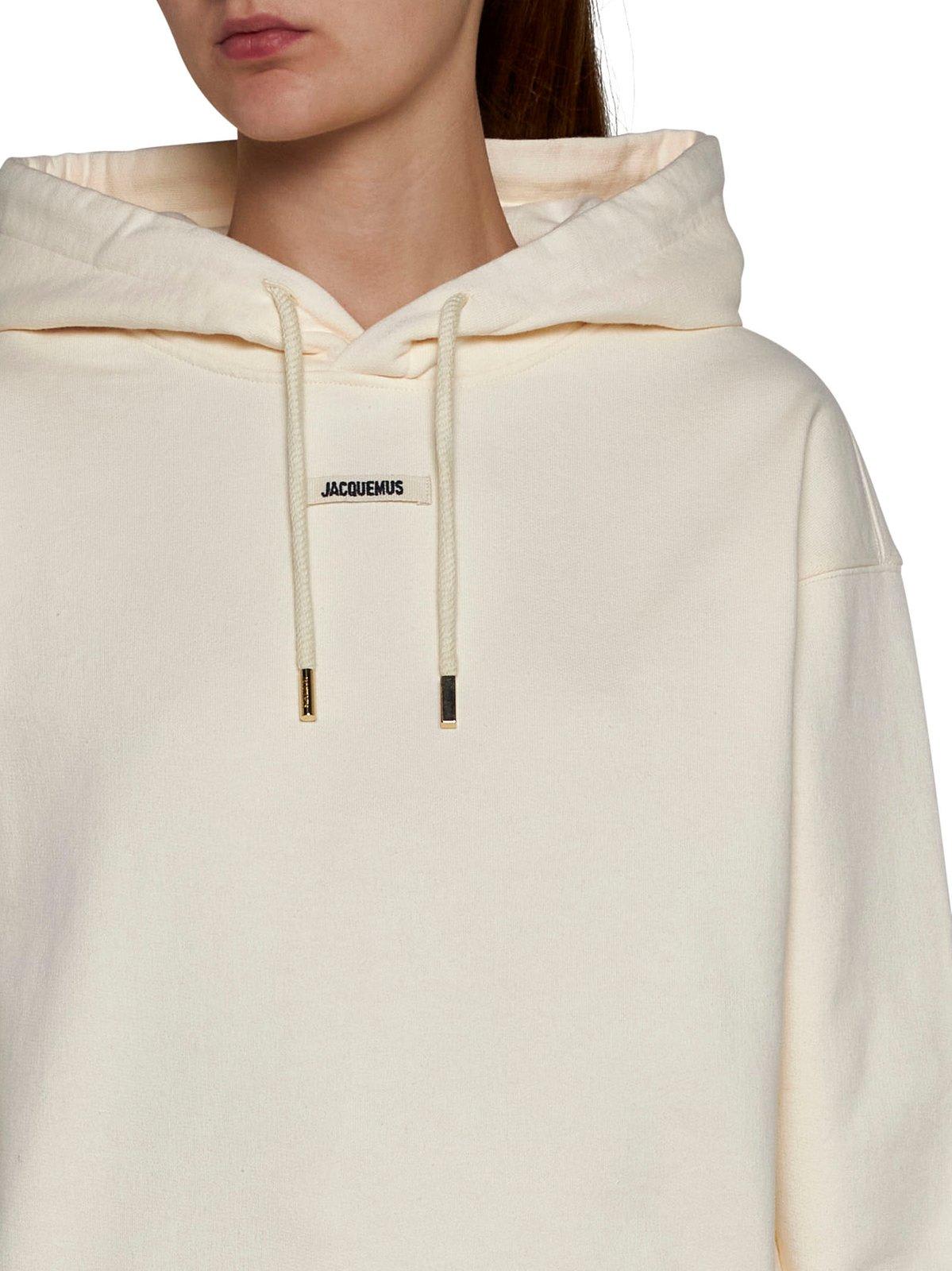 Shop Jacquemus Logo Patch Drawstring Hoodie In Beige