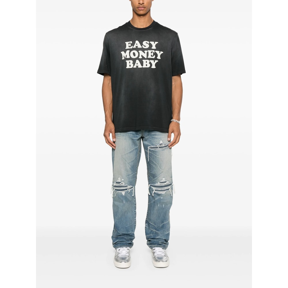 Amiri Men Blue Jeans With Ripped Details On The Front And Logo Patch On The Rear In Denim Man In Blue