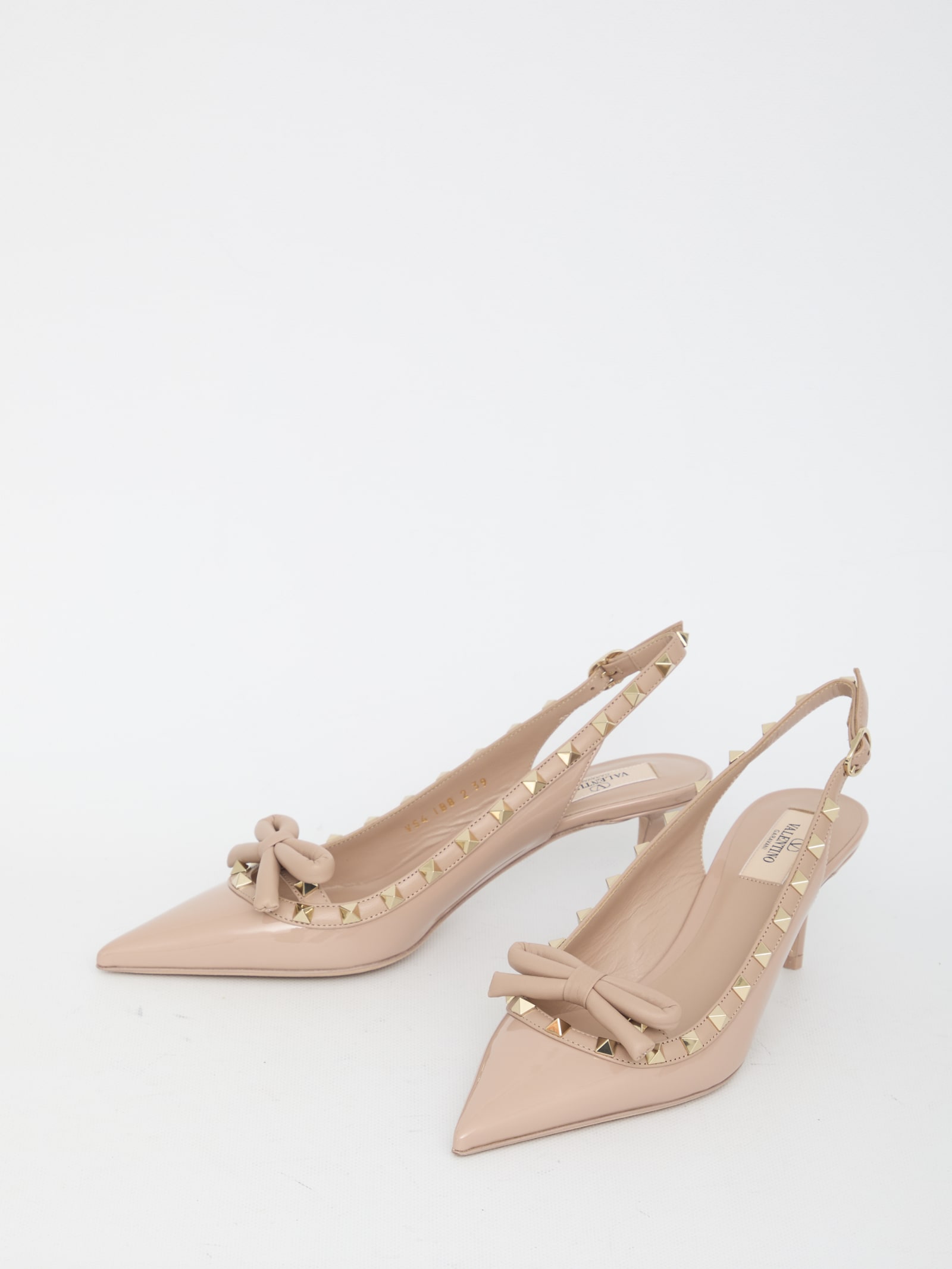 Shop Valentino Rockstud Bow Slingback Pumps In Pink