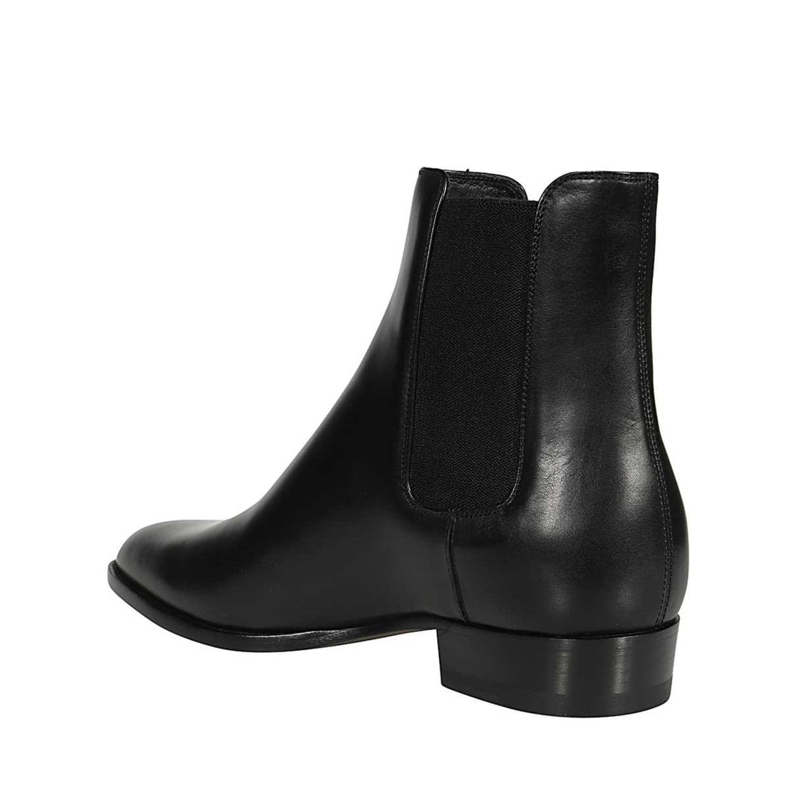 Shop Saint Laurent Chelsea Leather Boots In Black