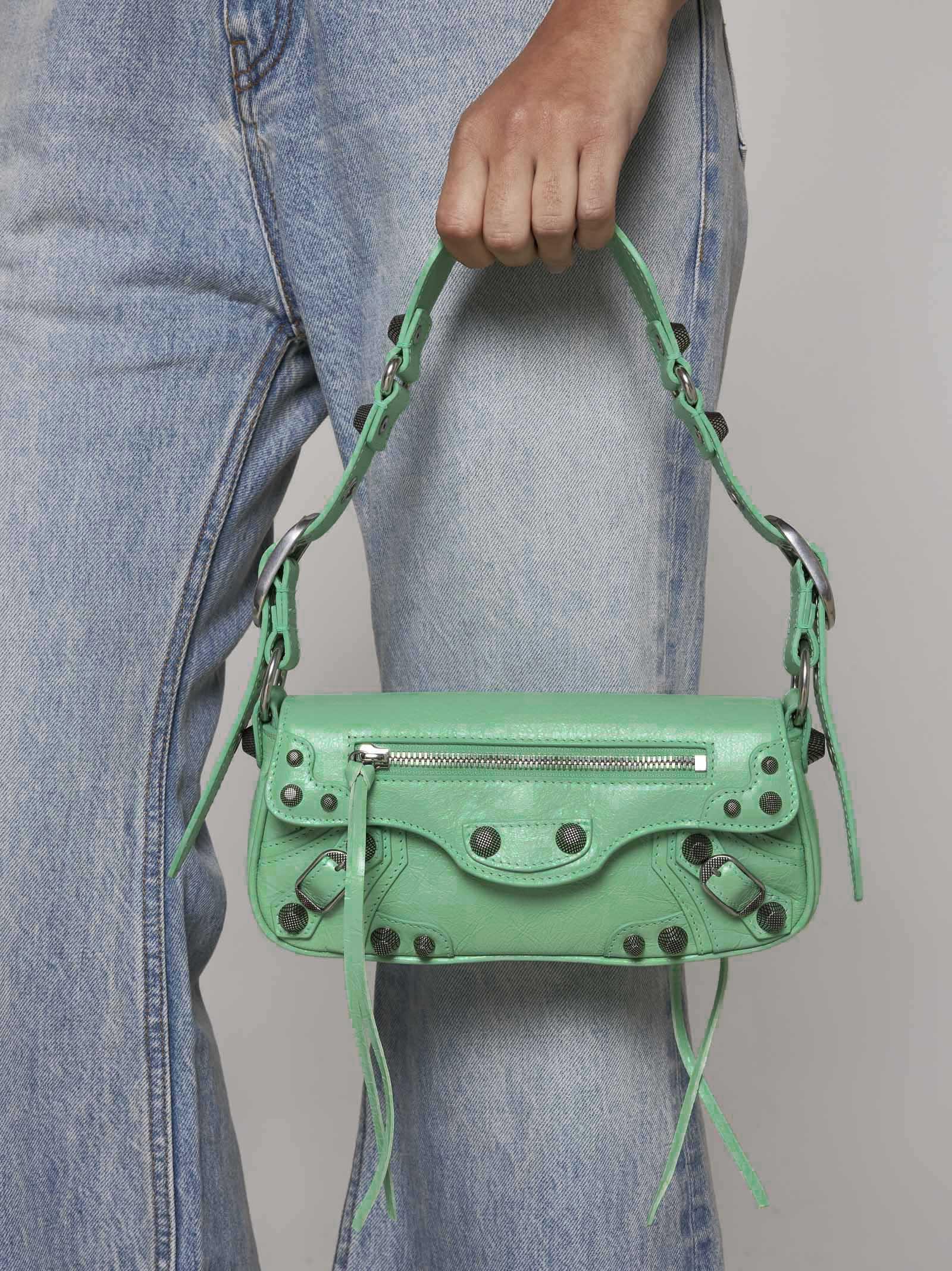 Shop Balenciaga Le Cagole Sling Leather Xs Bag In Green