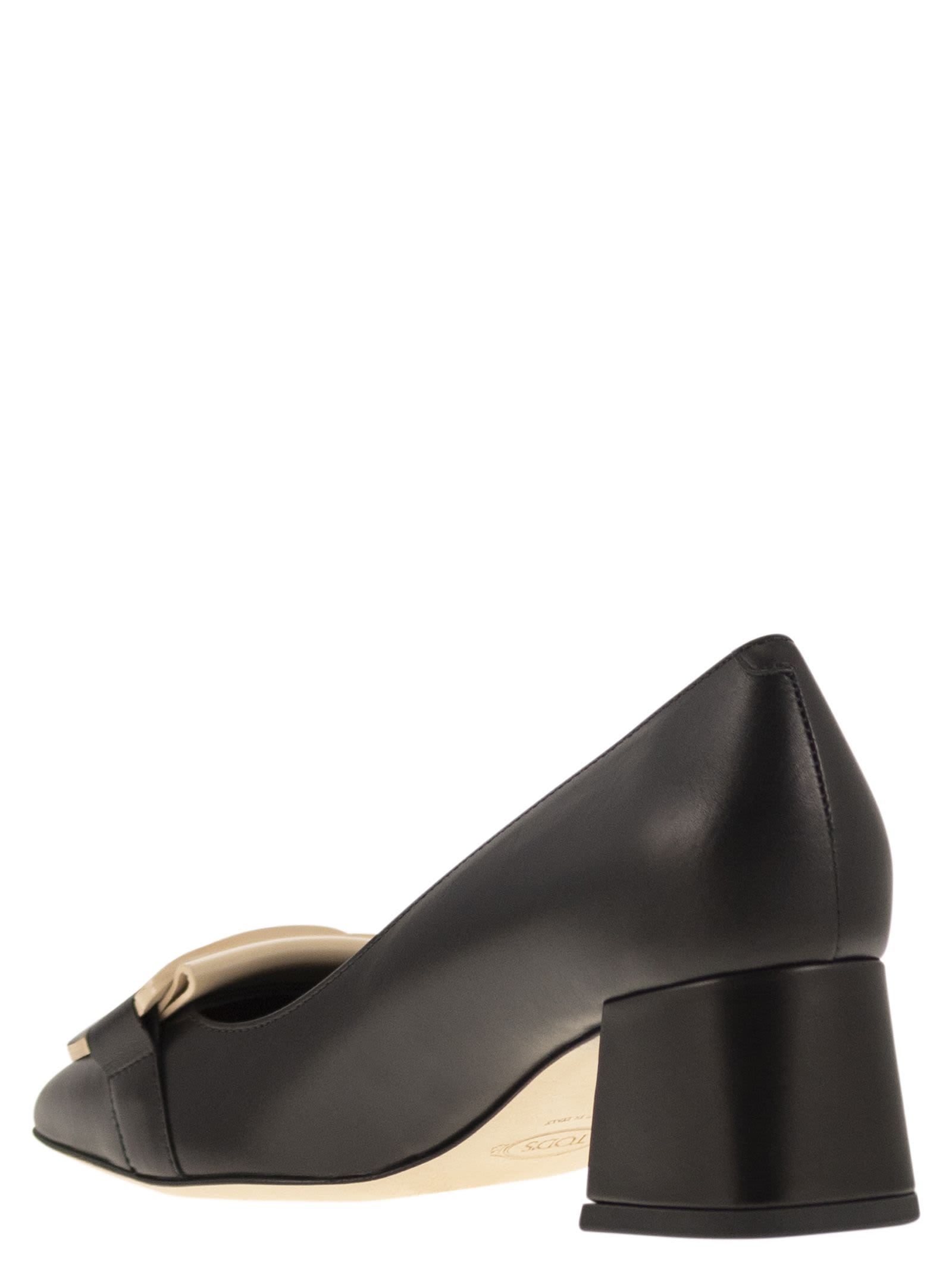 Shop Tod's Leather Pumps With Chain In Black