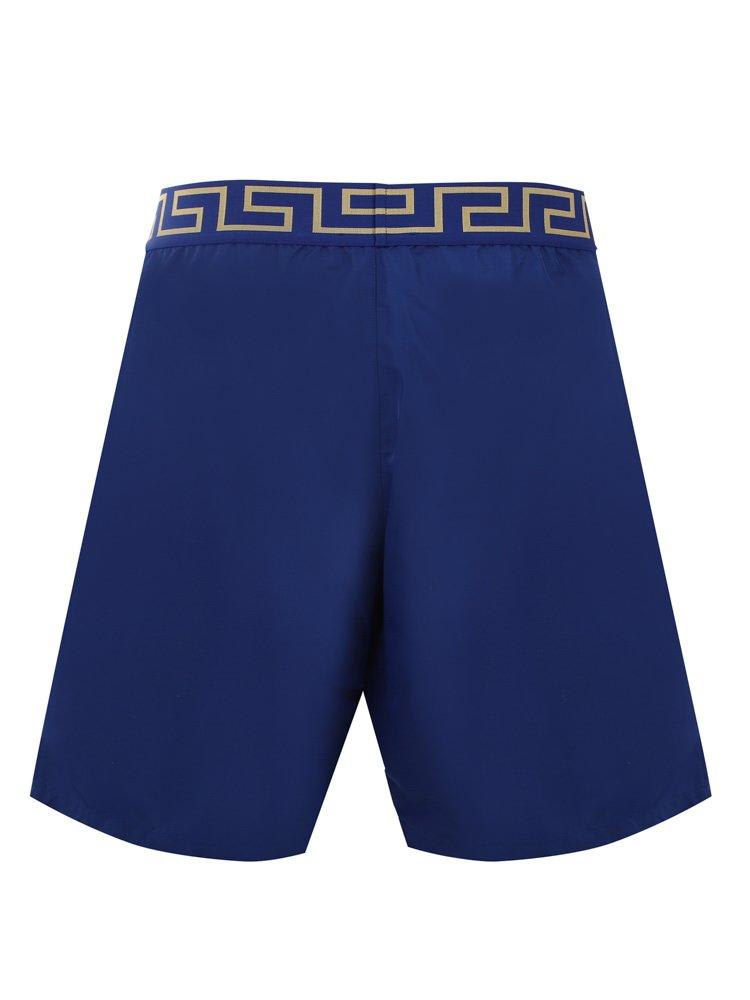 Shop Versace Greca Waistband Swim Shorts In Blu