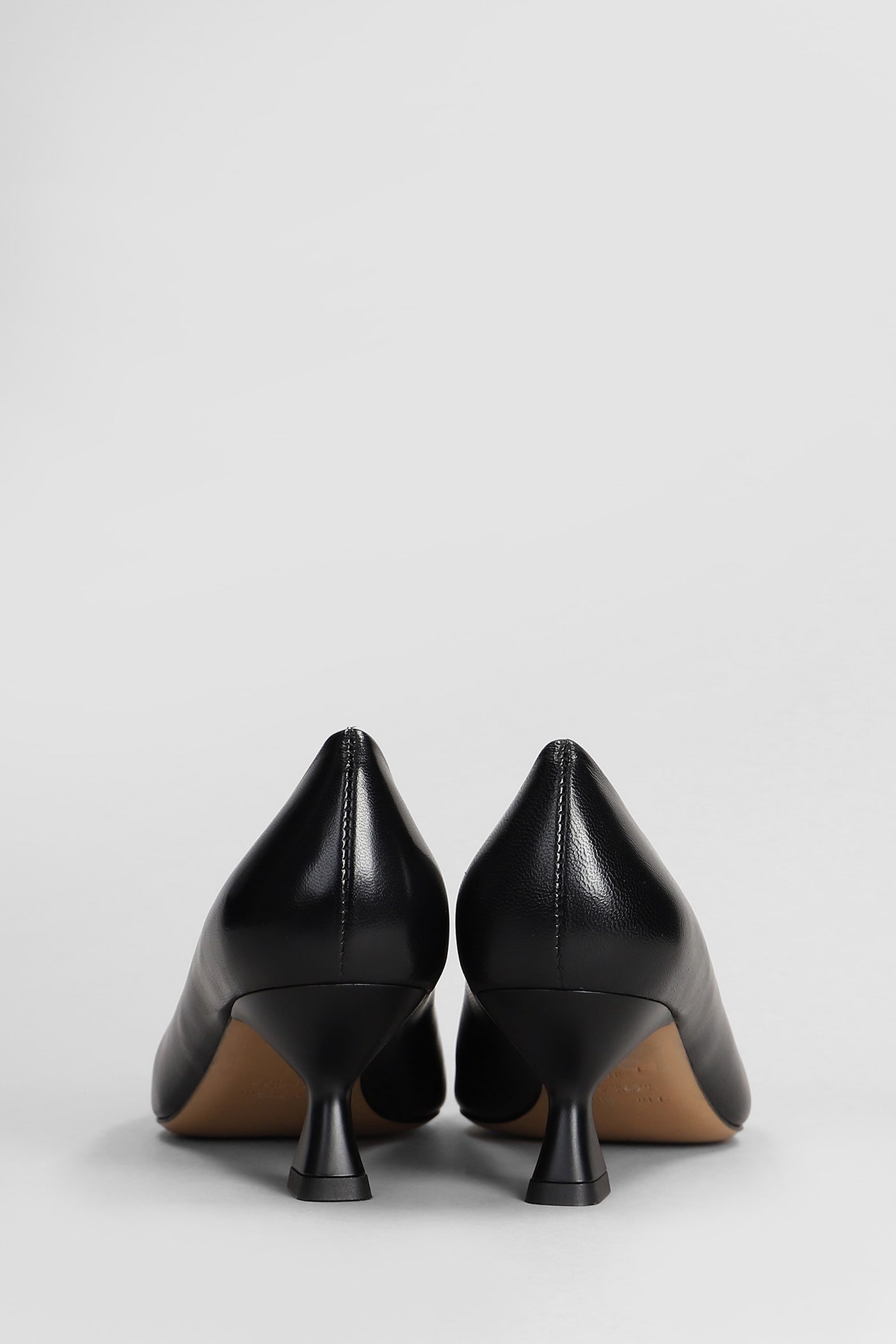 Shop The Seller Pumps In Black Leather