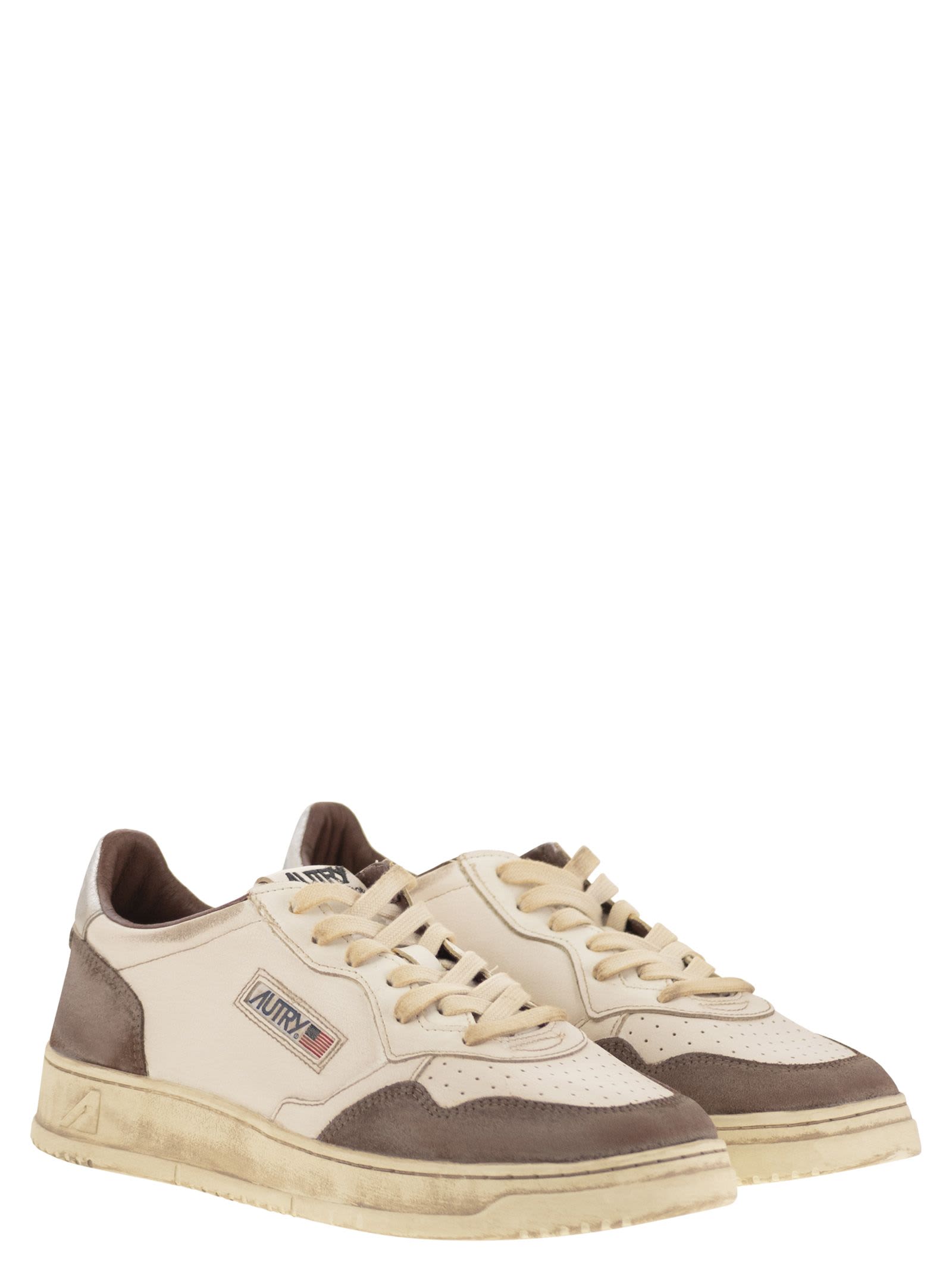 Autry Low Top Sneakers With Contrasting Leather Inserts In White