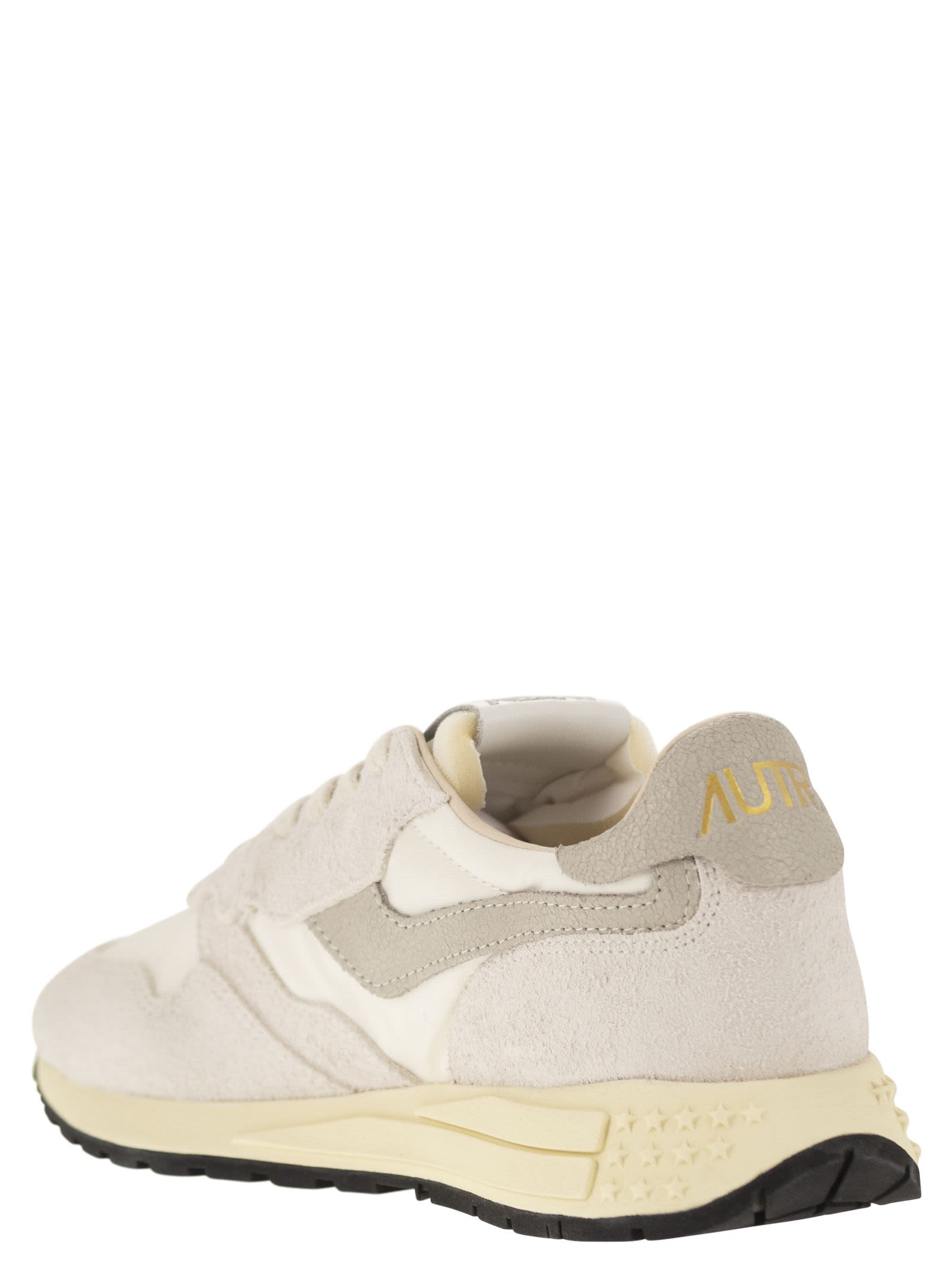 Shop Autry Reelwind - Suede And Technical Textile Trainer In Wht/nat
