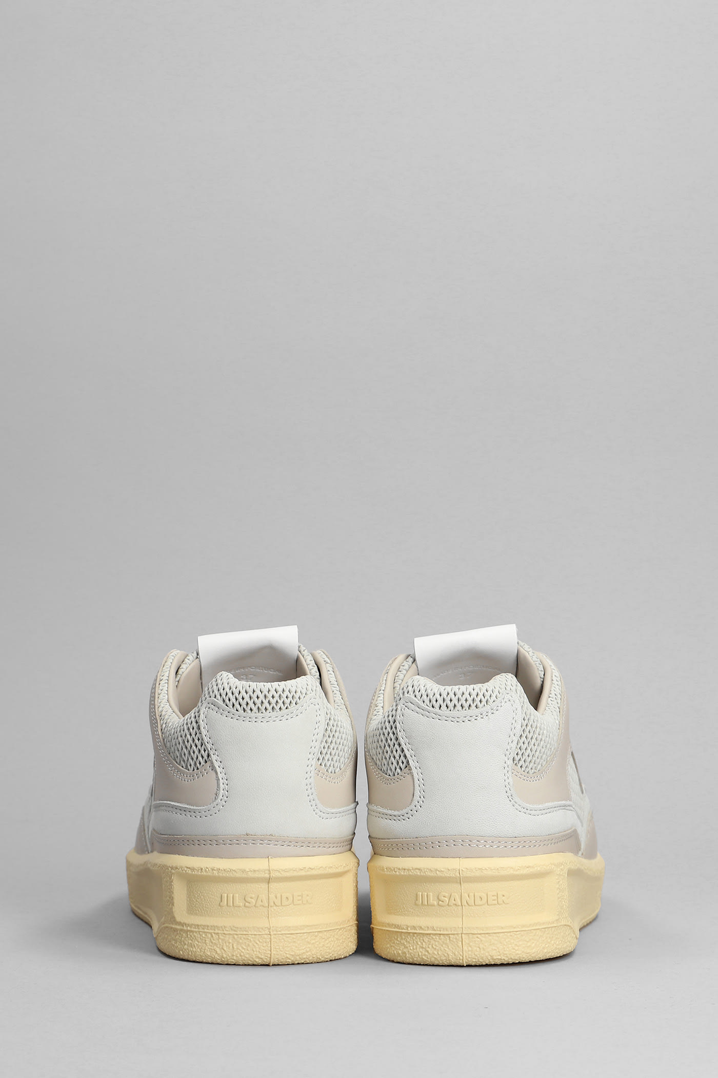 JIL SANDER GREY CANVAS AND RUBBER BASKET SNEAKERS