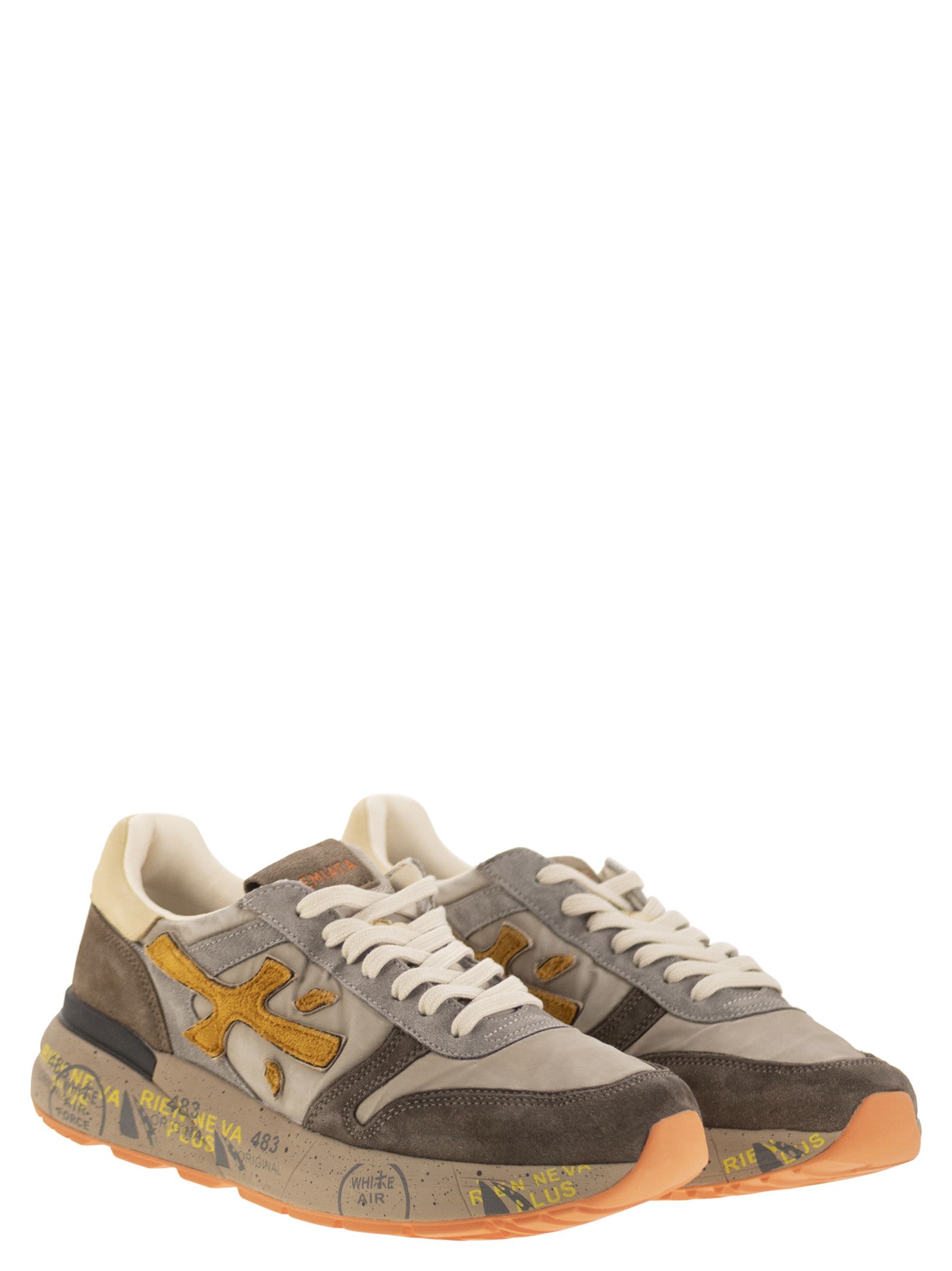 Premiata Sneakers With Contrast Panels And Round Toe In Brown