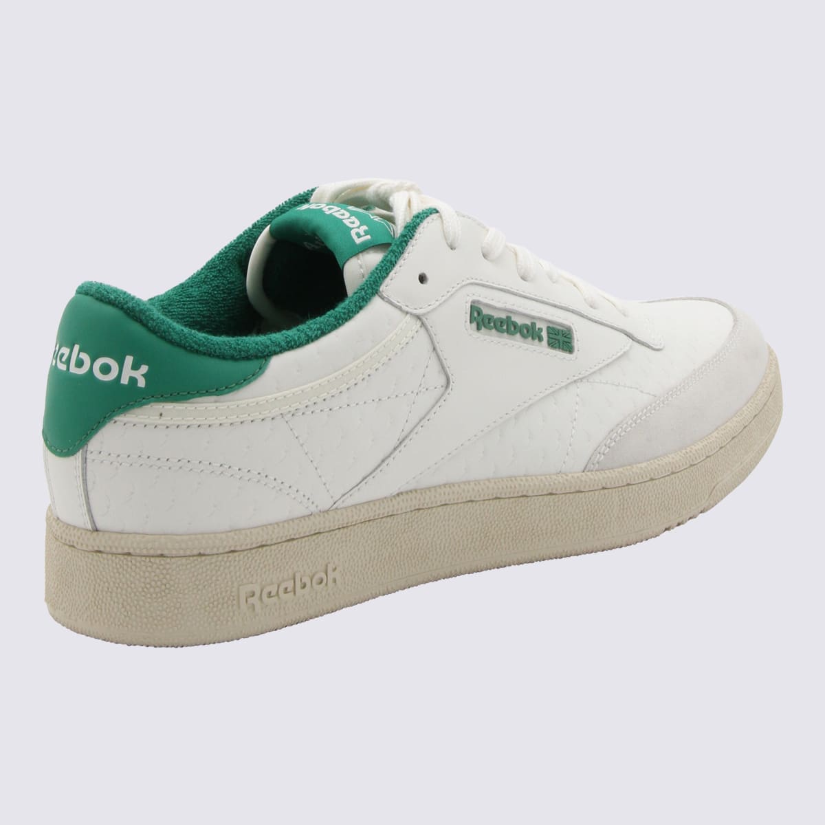Shop Reebok White And Green Leather Sneakers