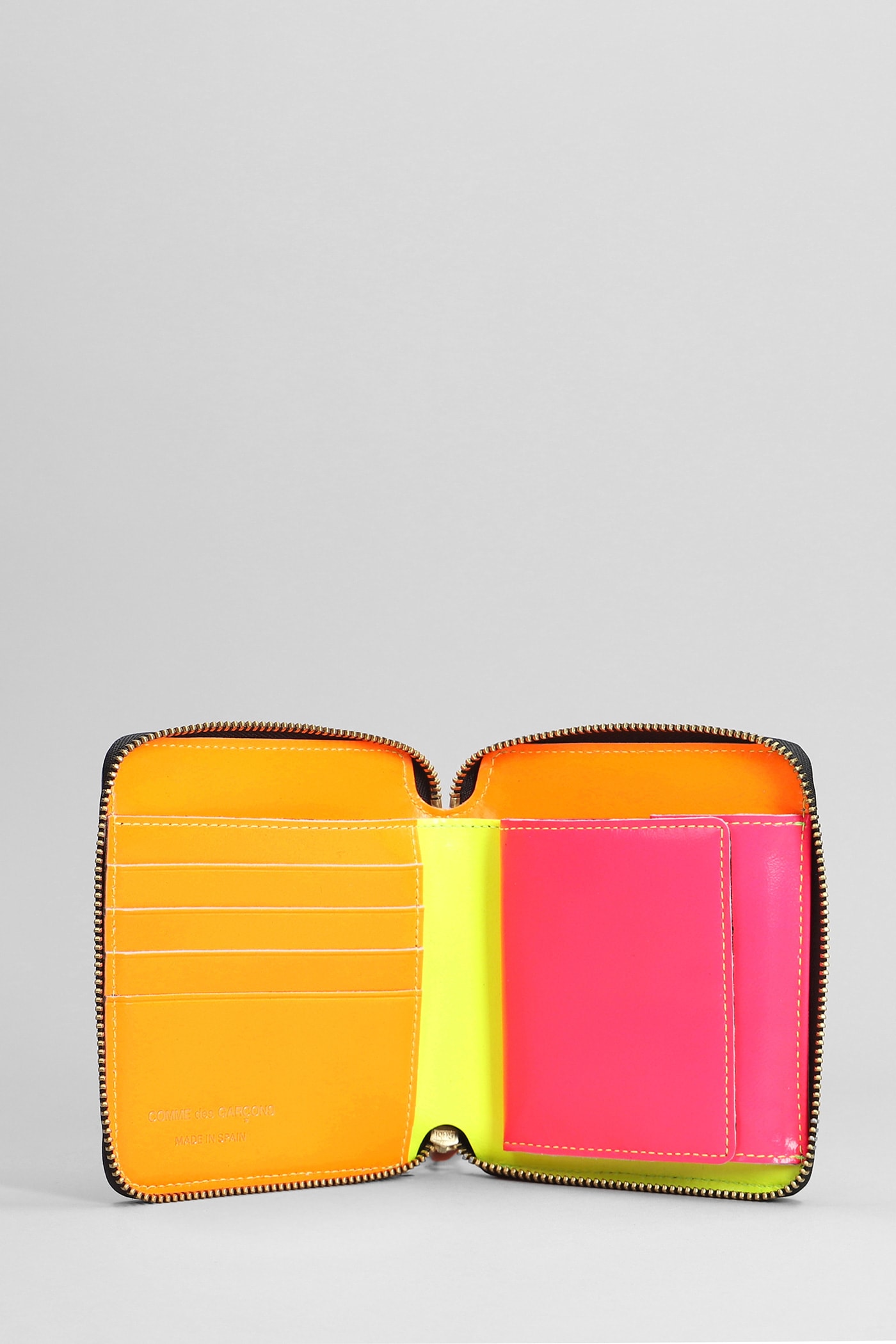 COMME DES GARÇONS WALLET IN YELLOW LEATHER