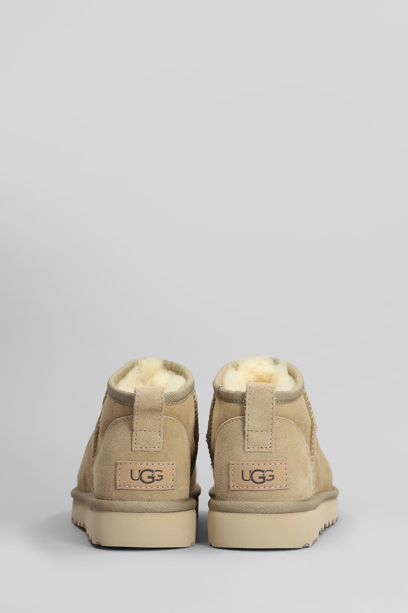 UGG CLASSIC ULTRA MINI LOW HEELS ANKLE BOOTS IN BEIGE SUEDE