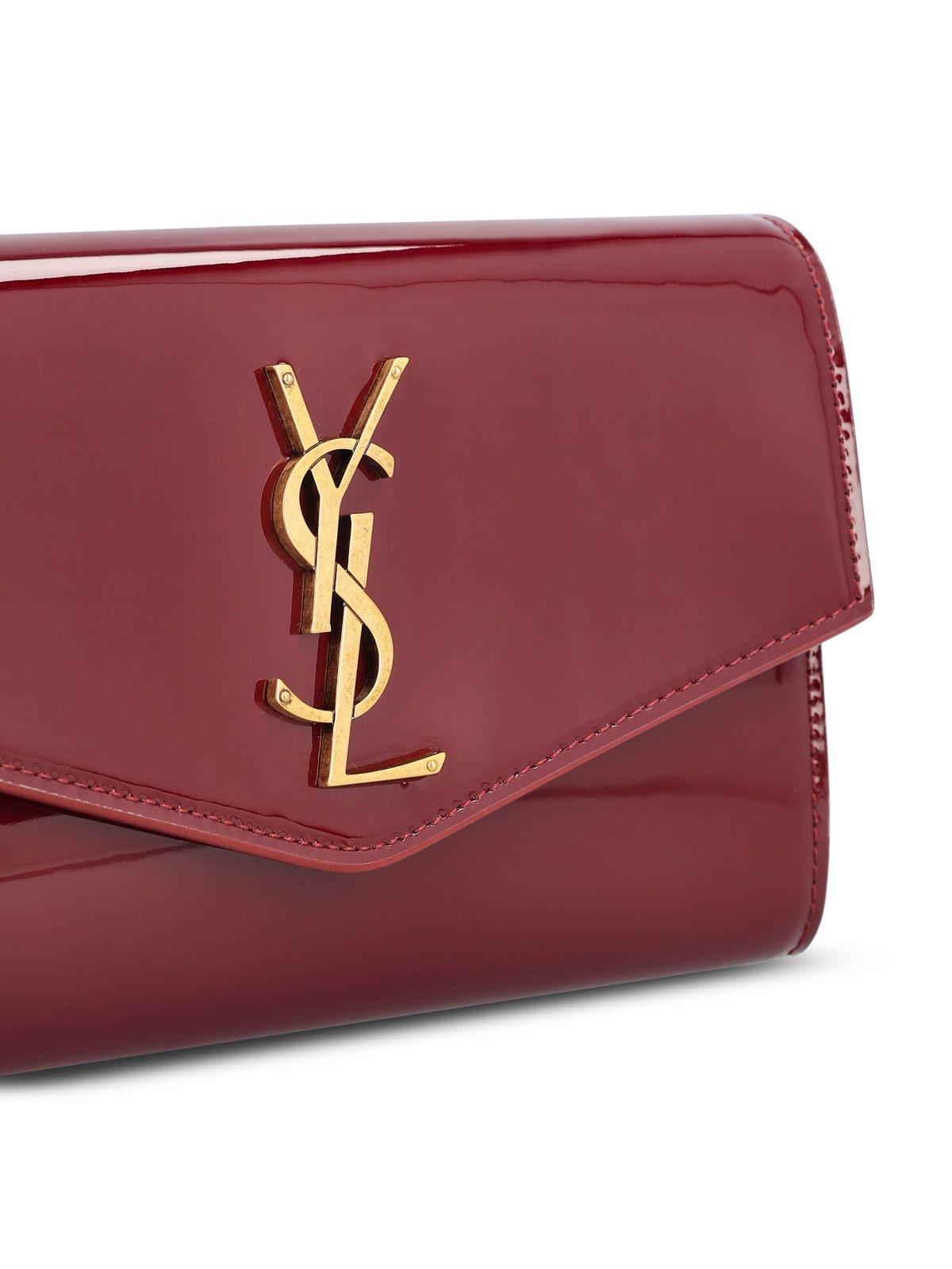 Shop Saint Laurent Logo Plaque Foldover Top Wallet In Red