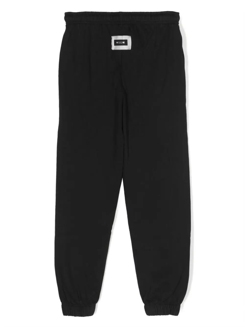 Shop Msgm Black Joggers With Logo Patch On The Back In Nero