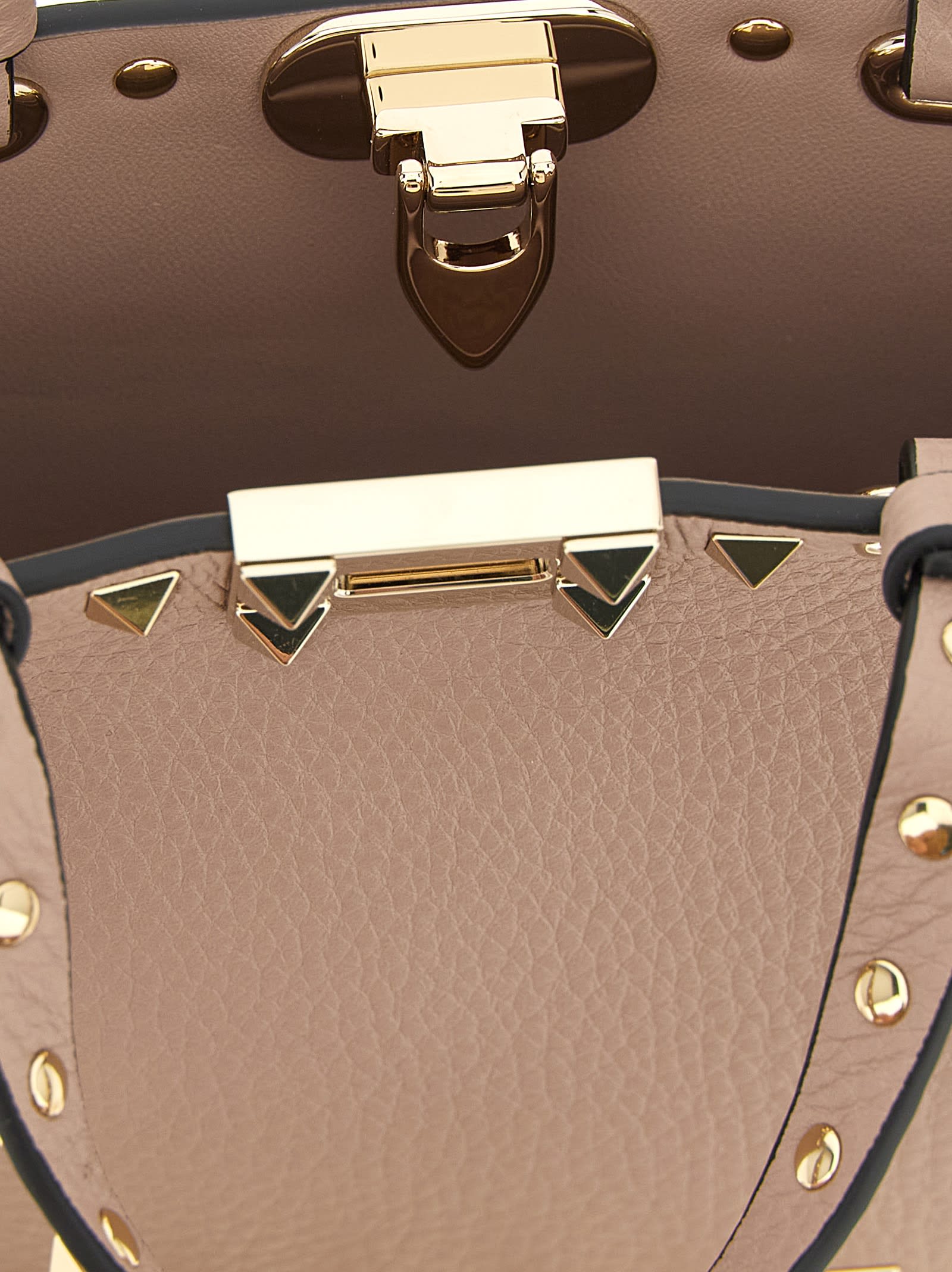 Valentino Garavani Mini Rockstud Leather Top Handle Bag In Pink